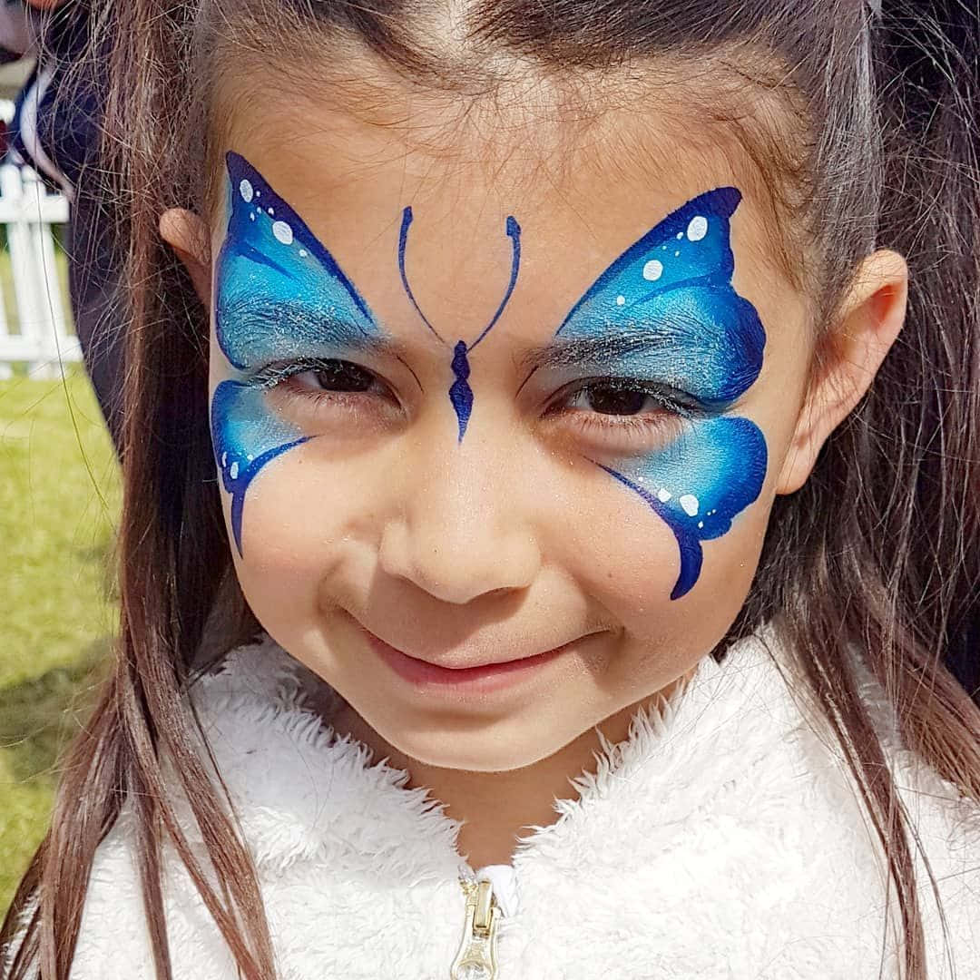 butterfly face paint, vibrant blue, brown hair, SD Desktop Wallpaper