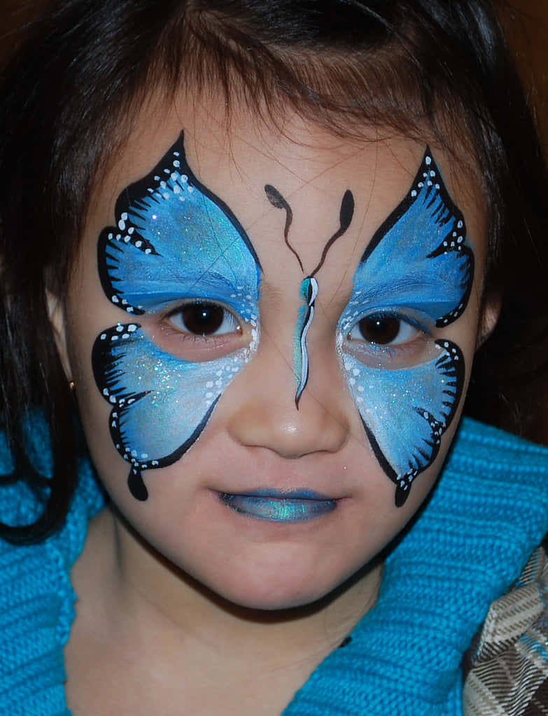 Butterfly Face Painting, vibrant blue butterfly wings, glittery accents, SD Phone Wallpaper