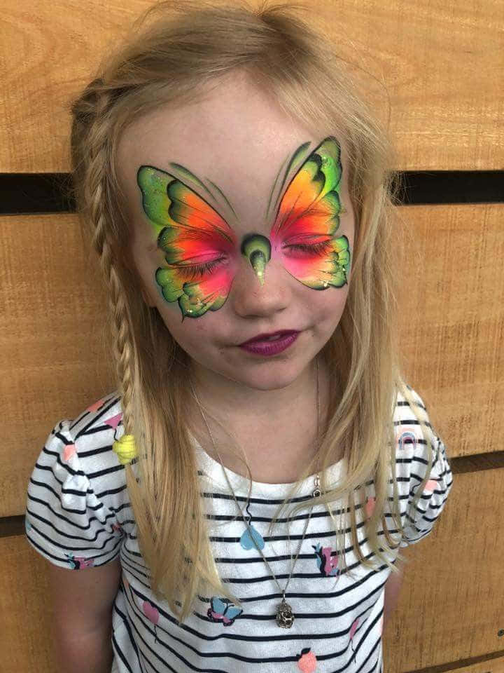 butterfly face paint, blonde braids, wooden background, SD Phone Wallpaper