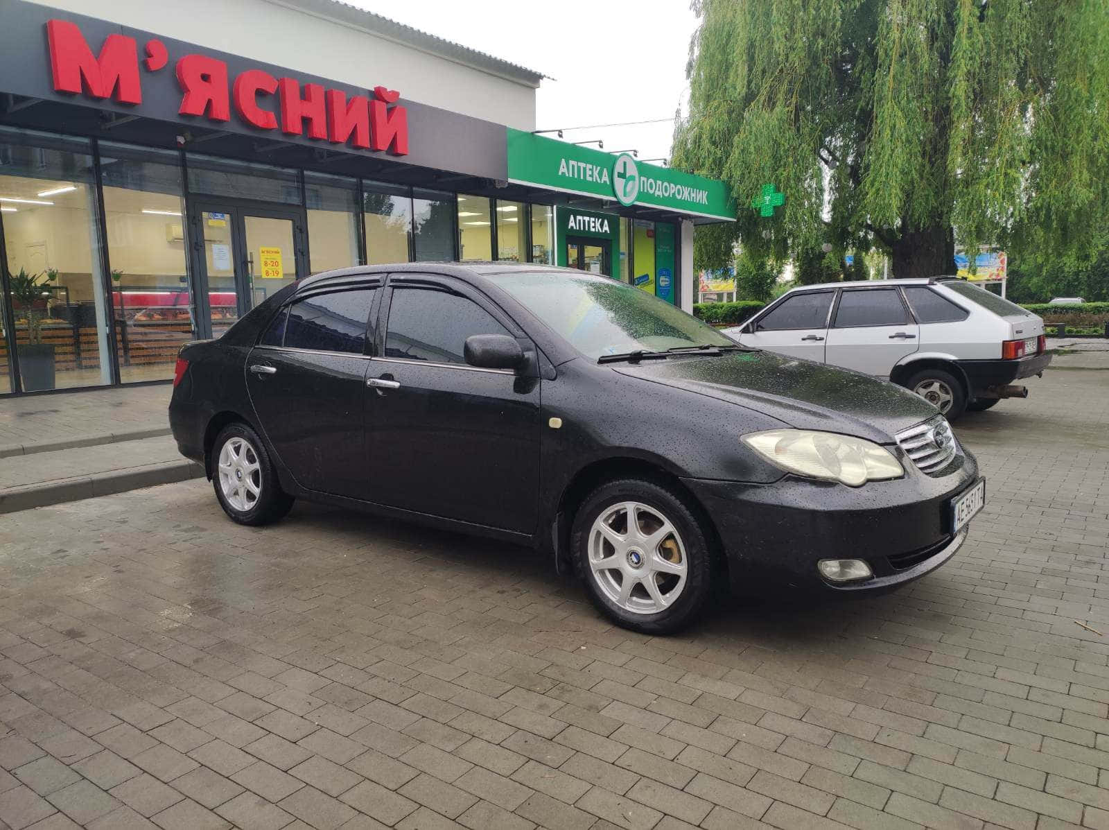 Byd F3, black sedan, wet brick pavement, HD Desktop Wallpaper