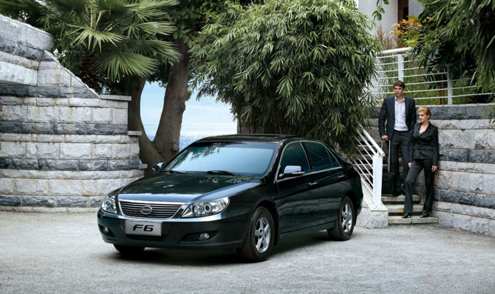 BYD, sleek black sedan, stone-paved driveway, HD Desktop Wallpaper