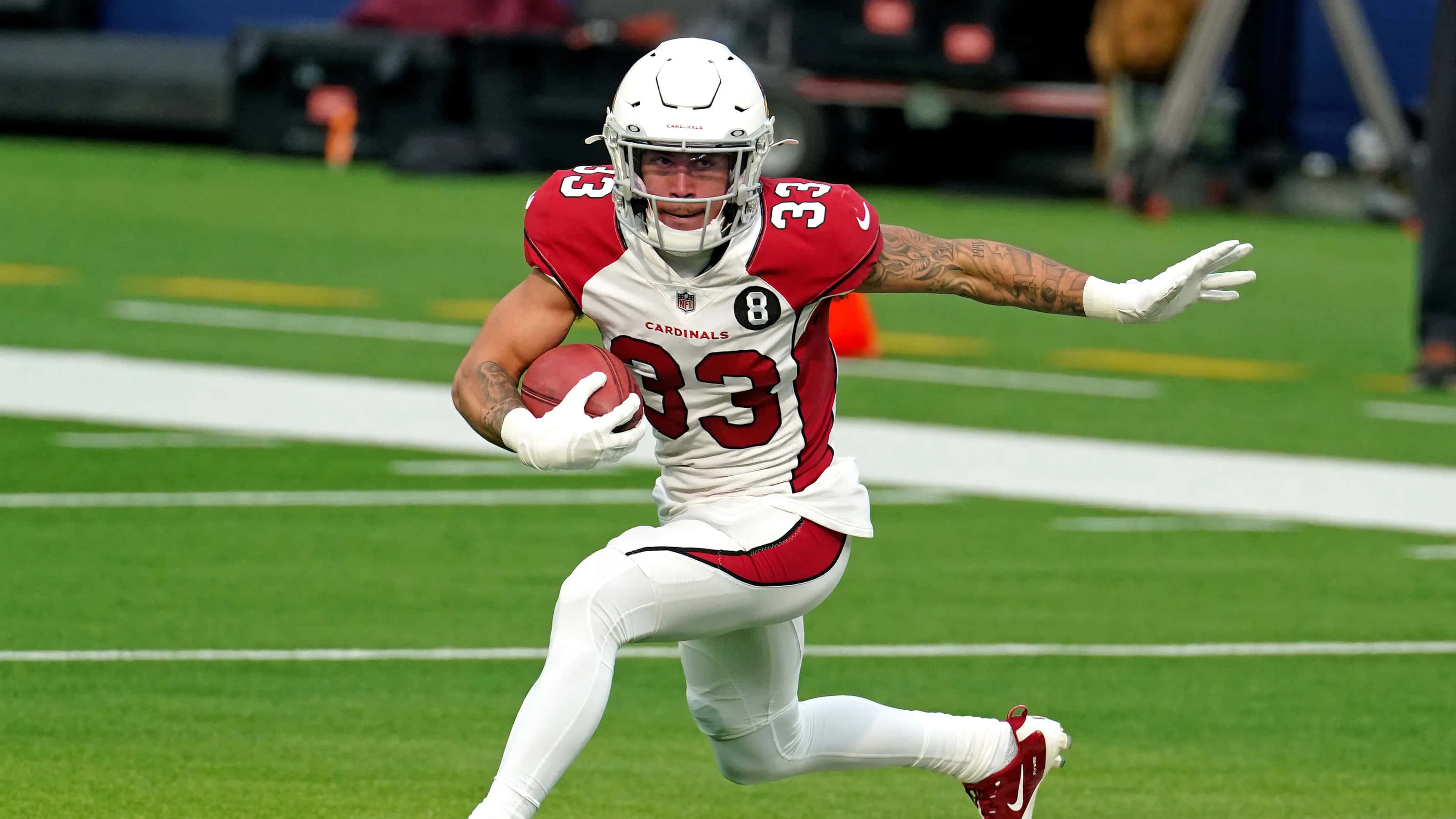 Byron Murphy, red and white uniform, green field, 2K Desktop Wallpaper