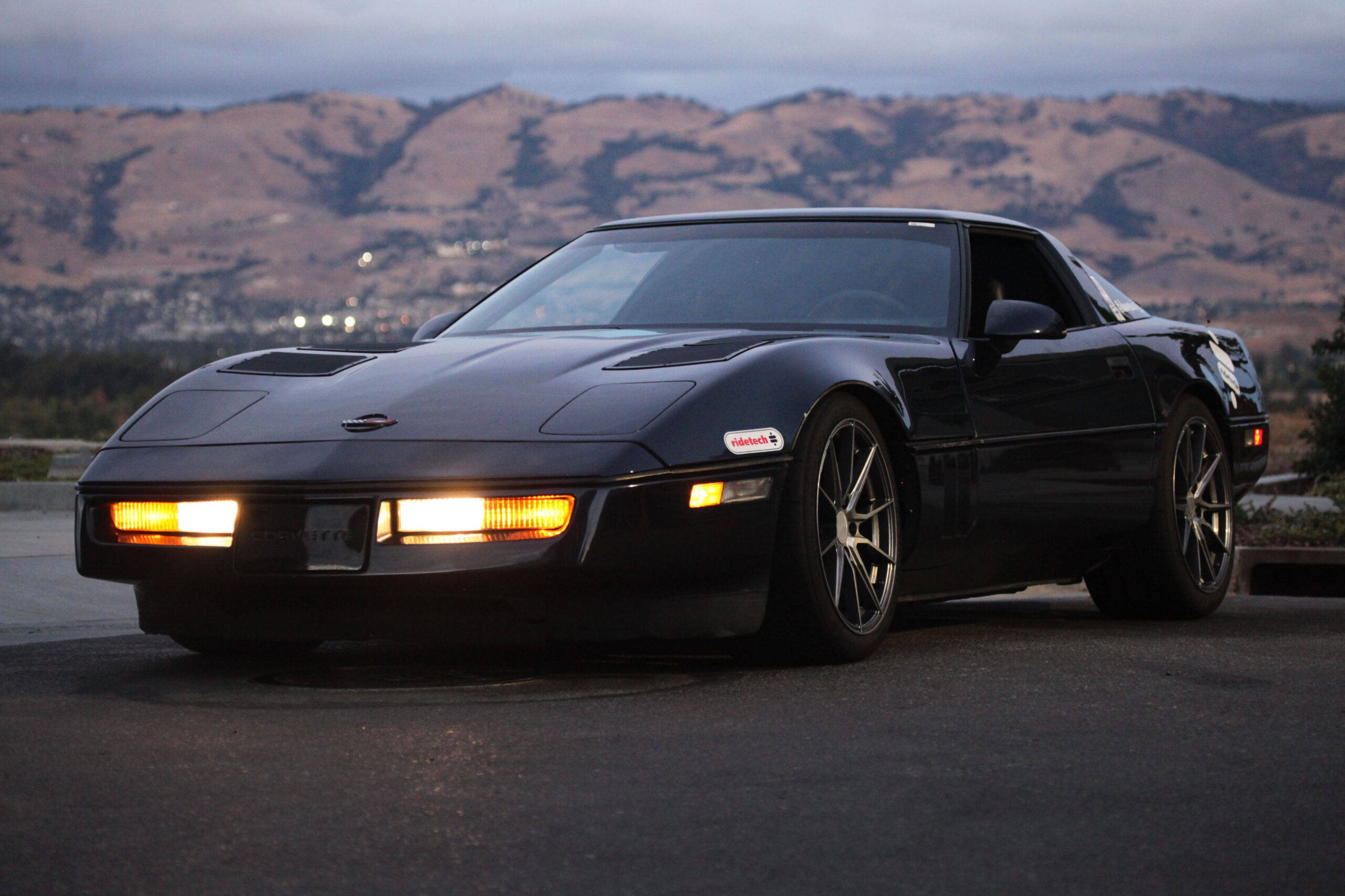C4 Corvette, black, mountains, 2K Desktop Wallpaper