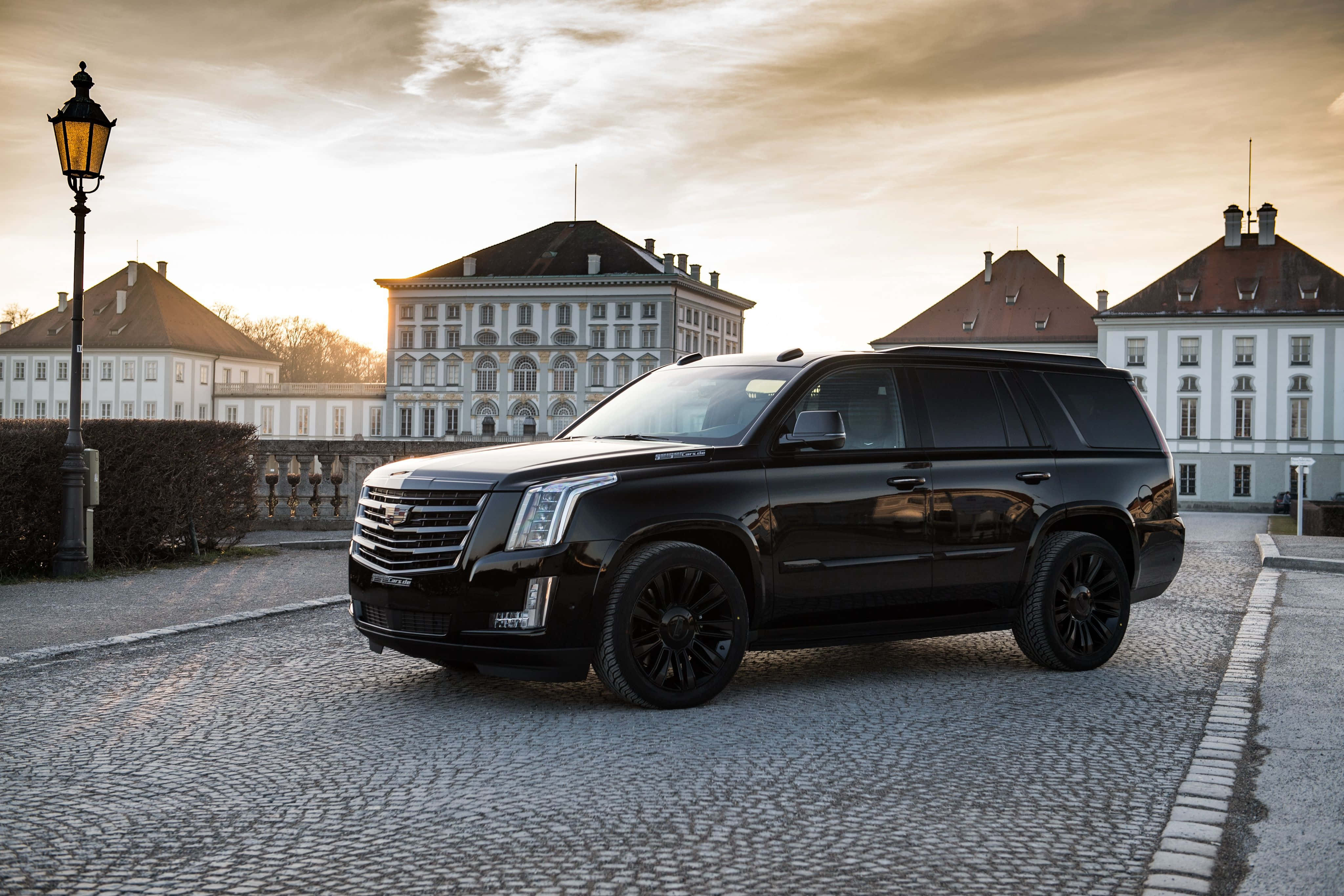 Cadillac Escalade, black, cobblestone courtyard, 4K Desktop Wallpaper
