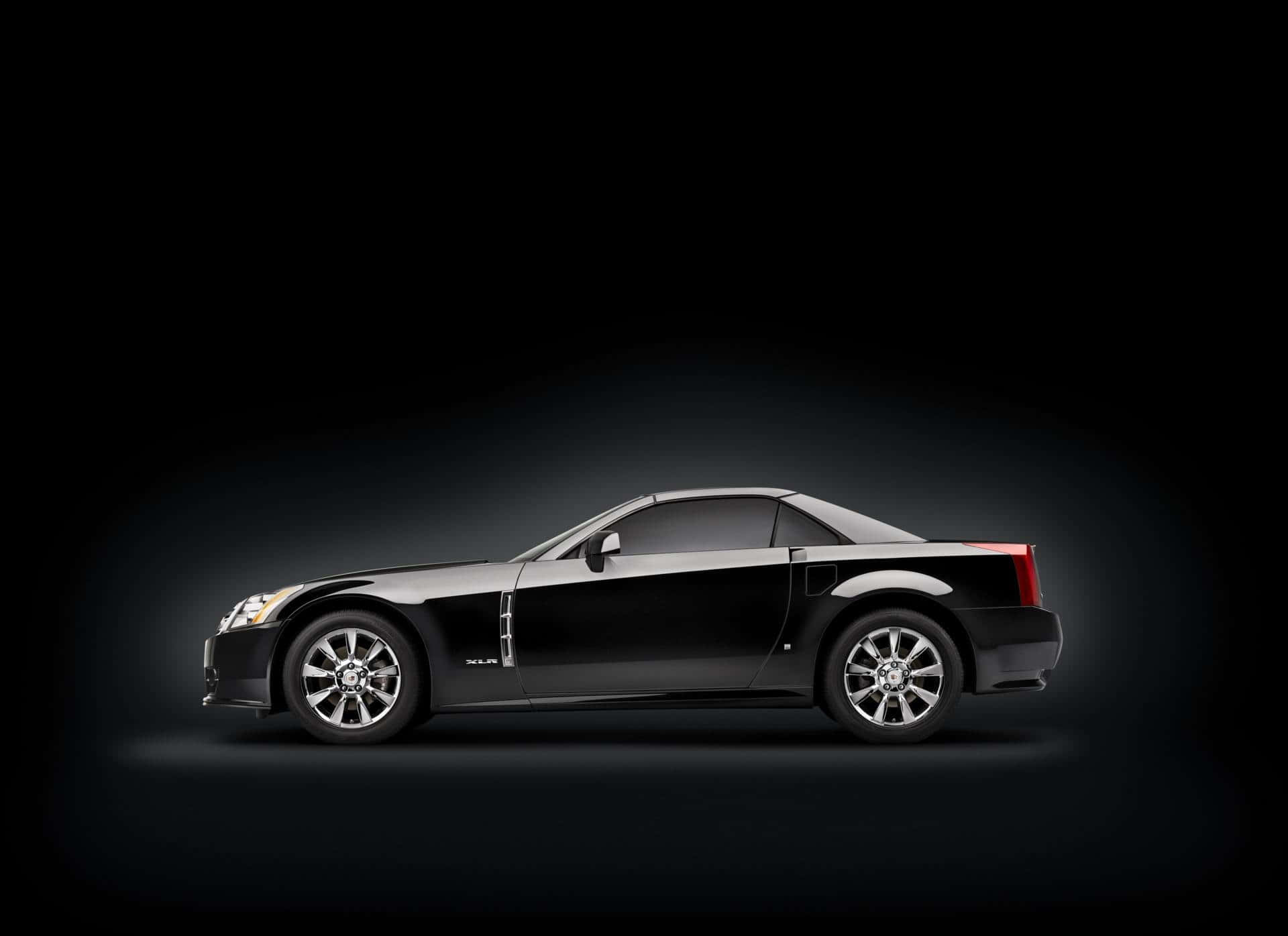 Cadillac XLR, sleek black, studio lighting, Full HD Desktop Wallpaper