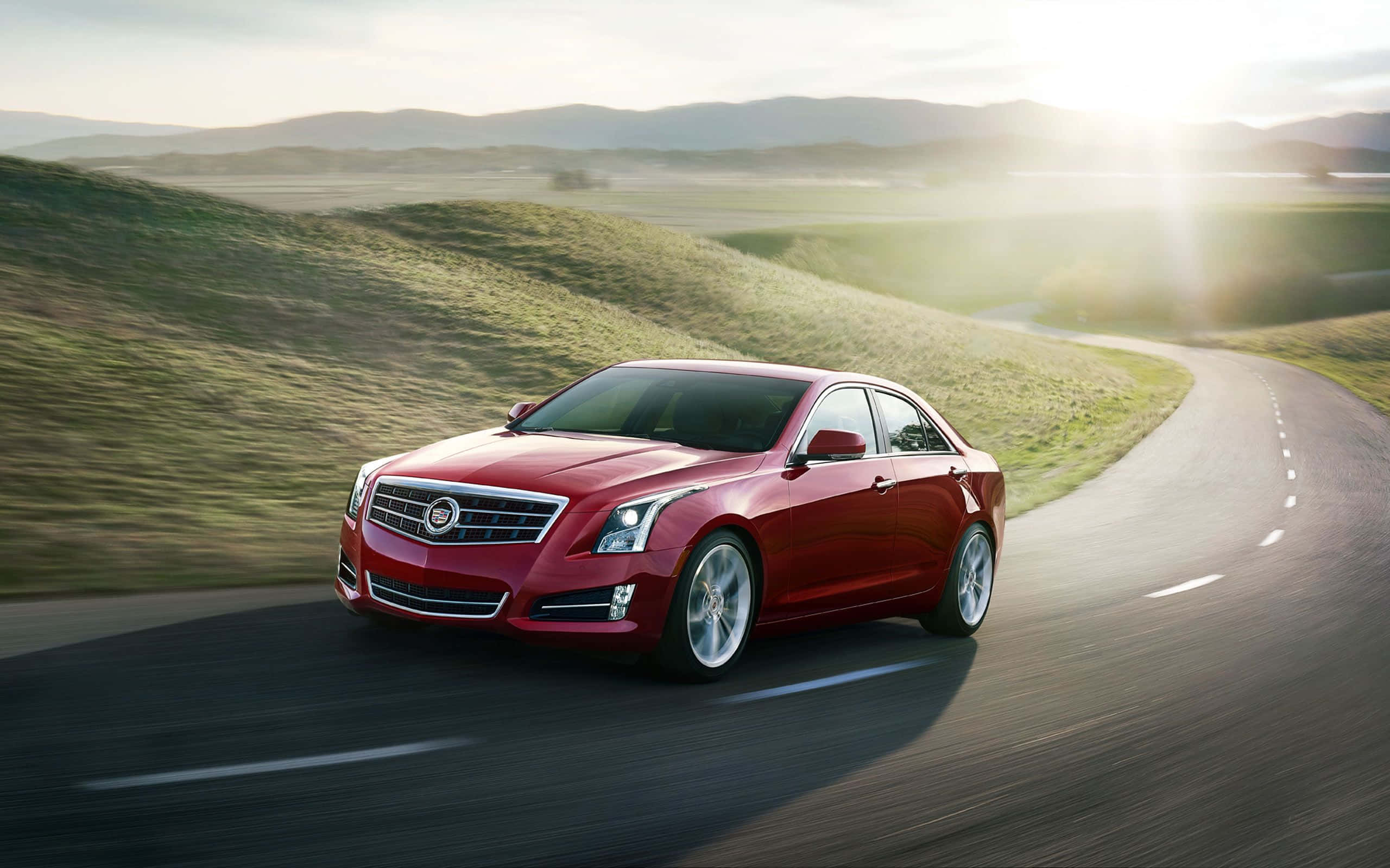 Cadillac XTS, red, winding rural road, 2K Desktop Wallpaper