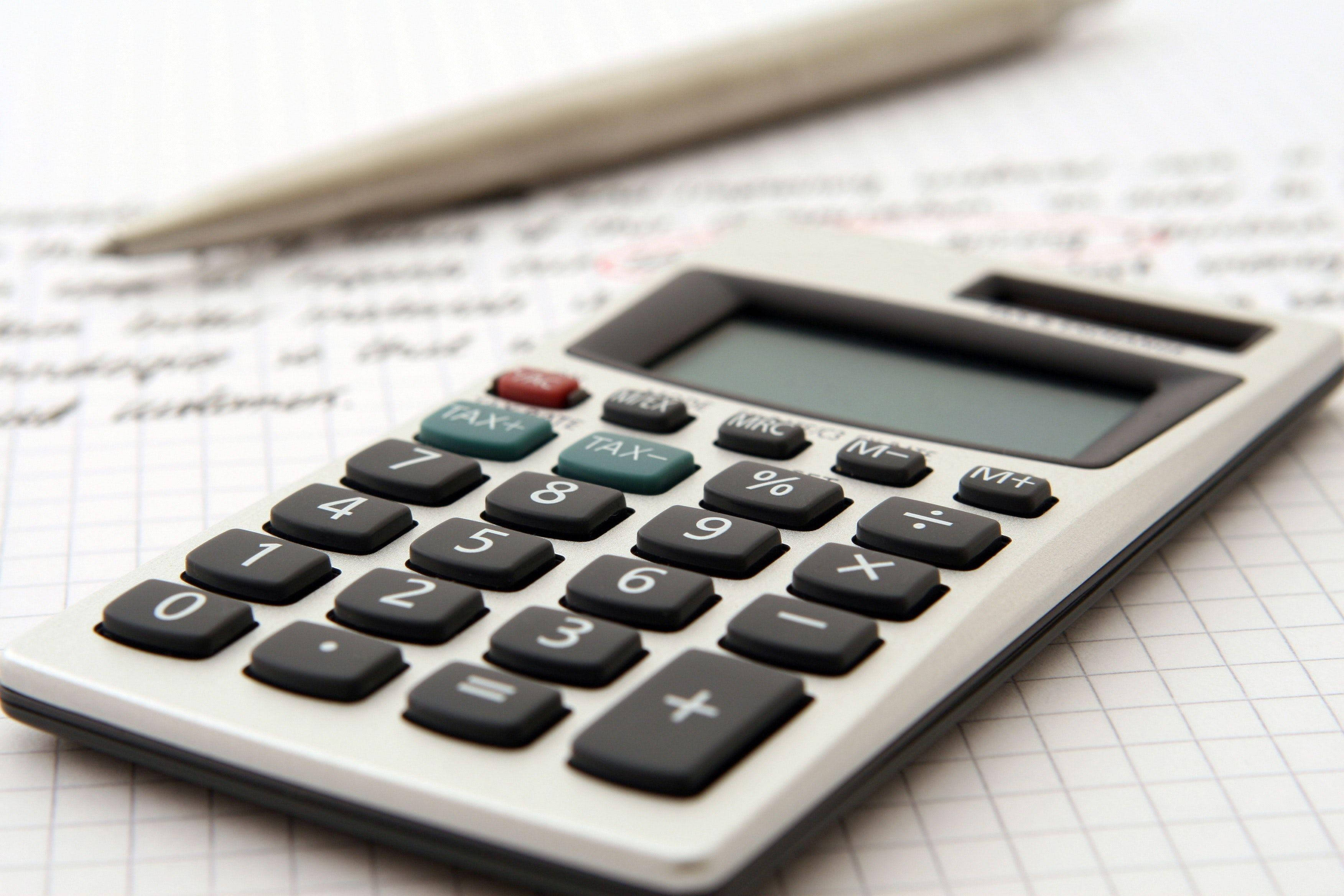 silver calculator, black keys, graph paper, 2K Desktop Wallpaper
