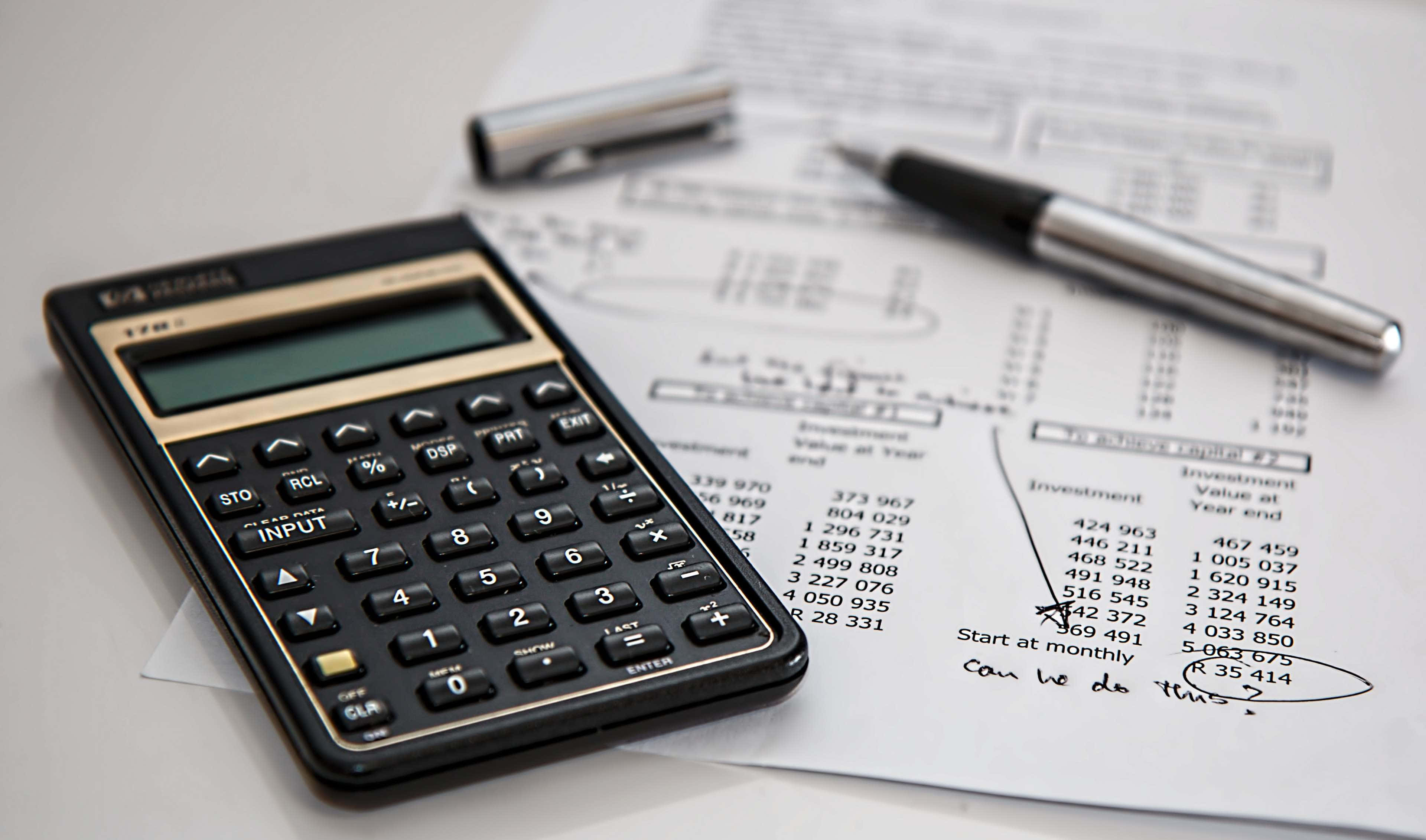 black calculator, financial documents, handwritten notes, 4K Desktop Wallpaper