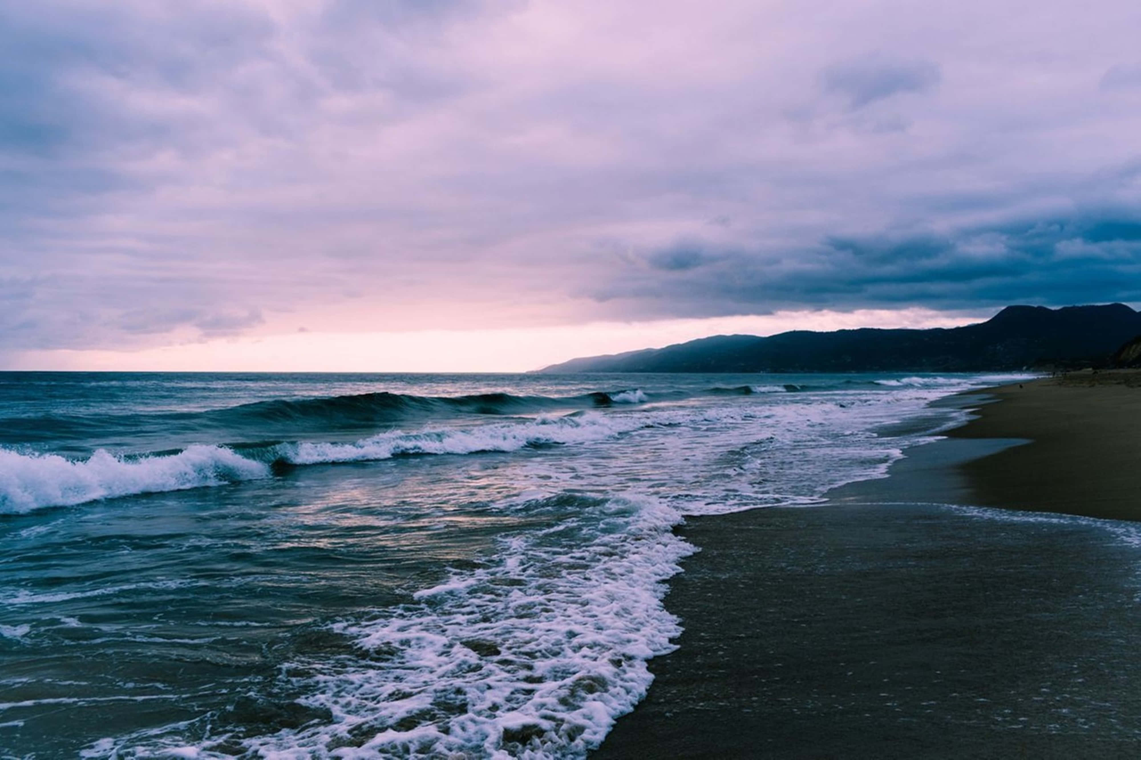 California 4K, dark sandy beach, moody purple and pink twilight sky, 4K Desktop Wallpaper