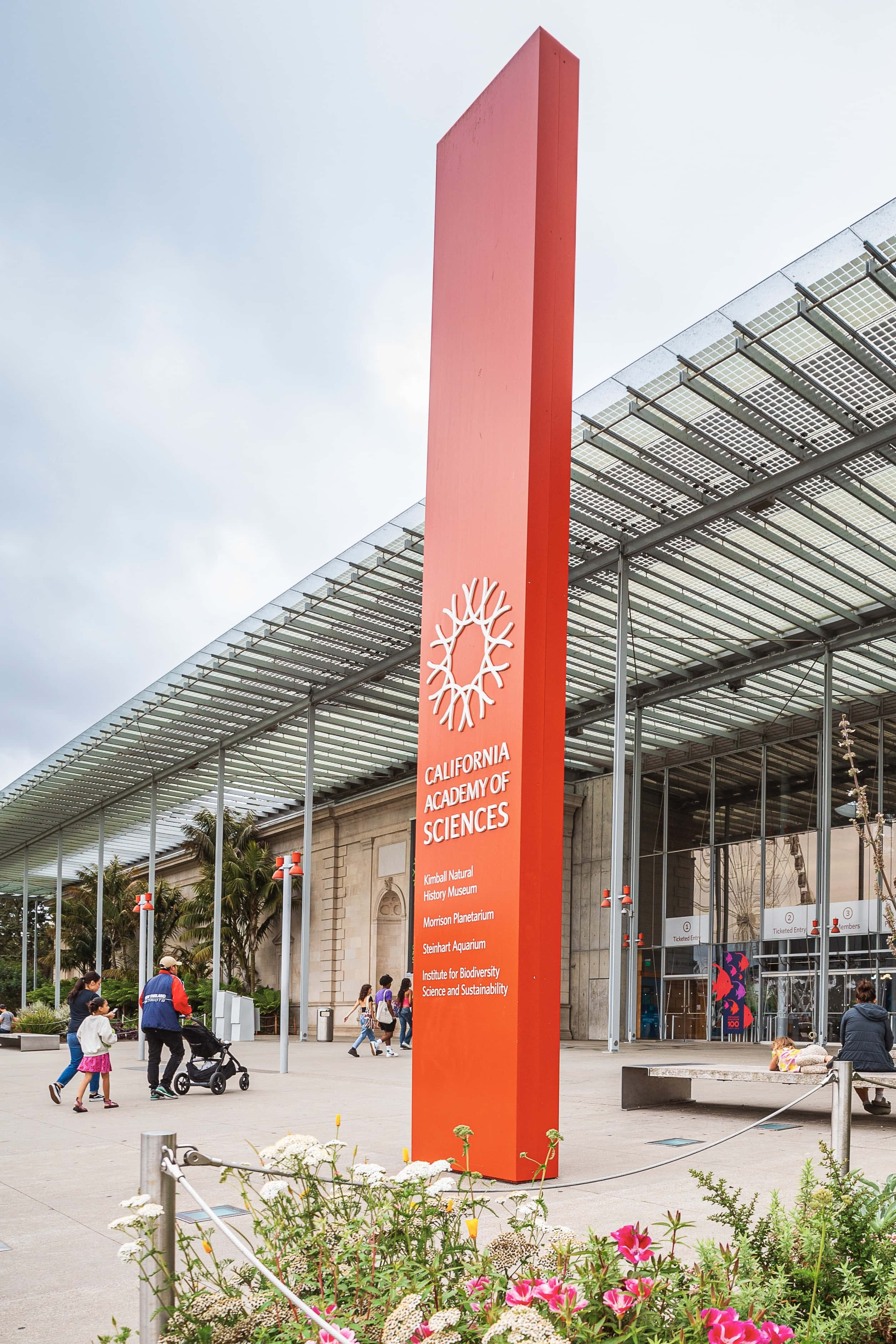 California Academy Of Sciences, red pillar, white text, 2K Phone Wallpaper