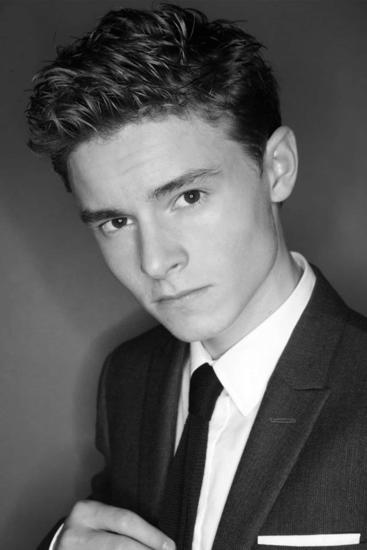 Callan Mcauliffe, black and white portrait, sharp suit, HD Phone Wallpaper