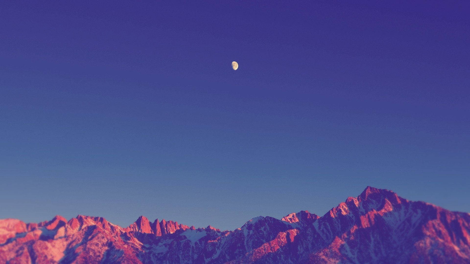 crescent moon, jagged snowcapped mountains, pink and purple twilight hues, Full HD Desktop Wallpaper