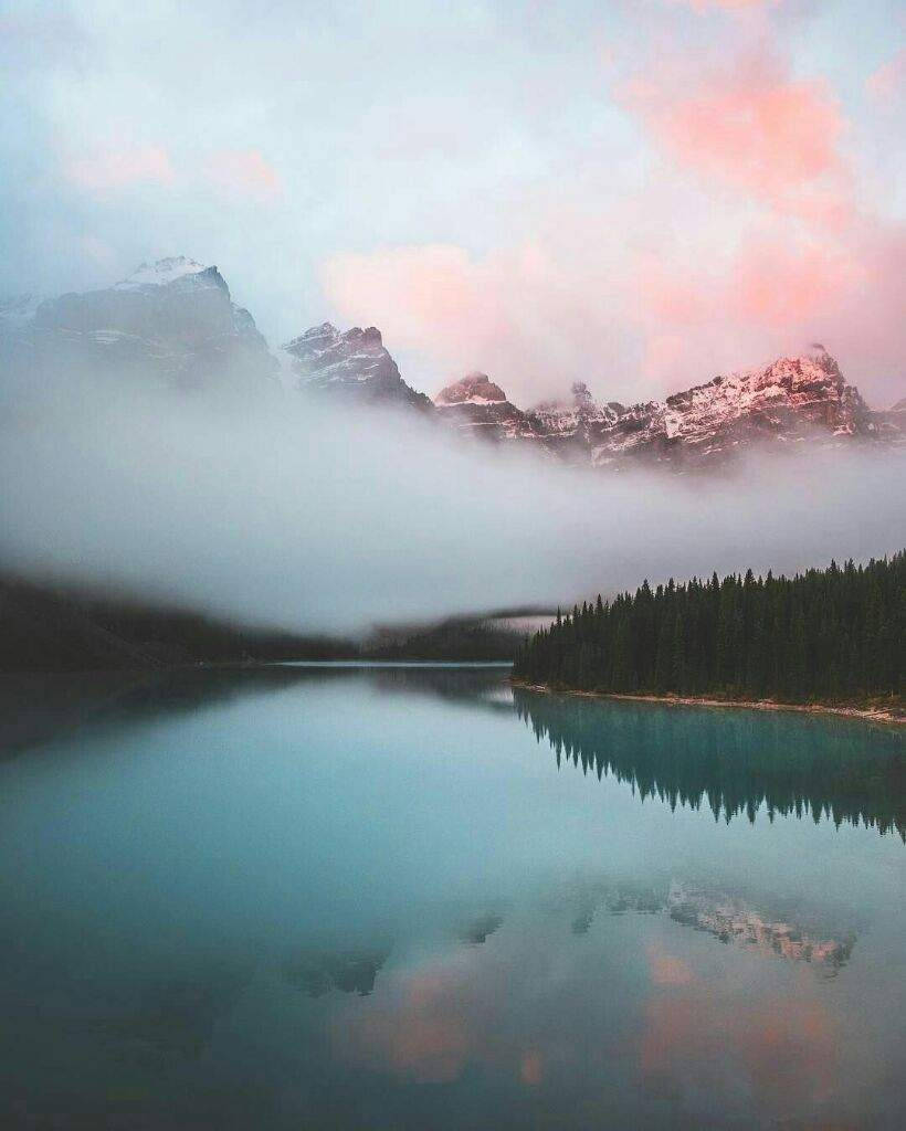 serene mountain lake, snow-capped peaks, pink-tinged clouds, SD Phone Wallpaper