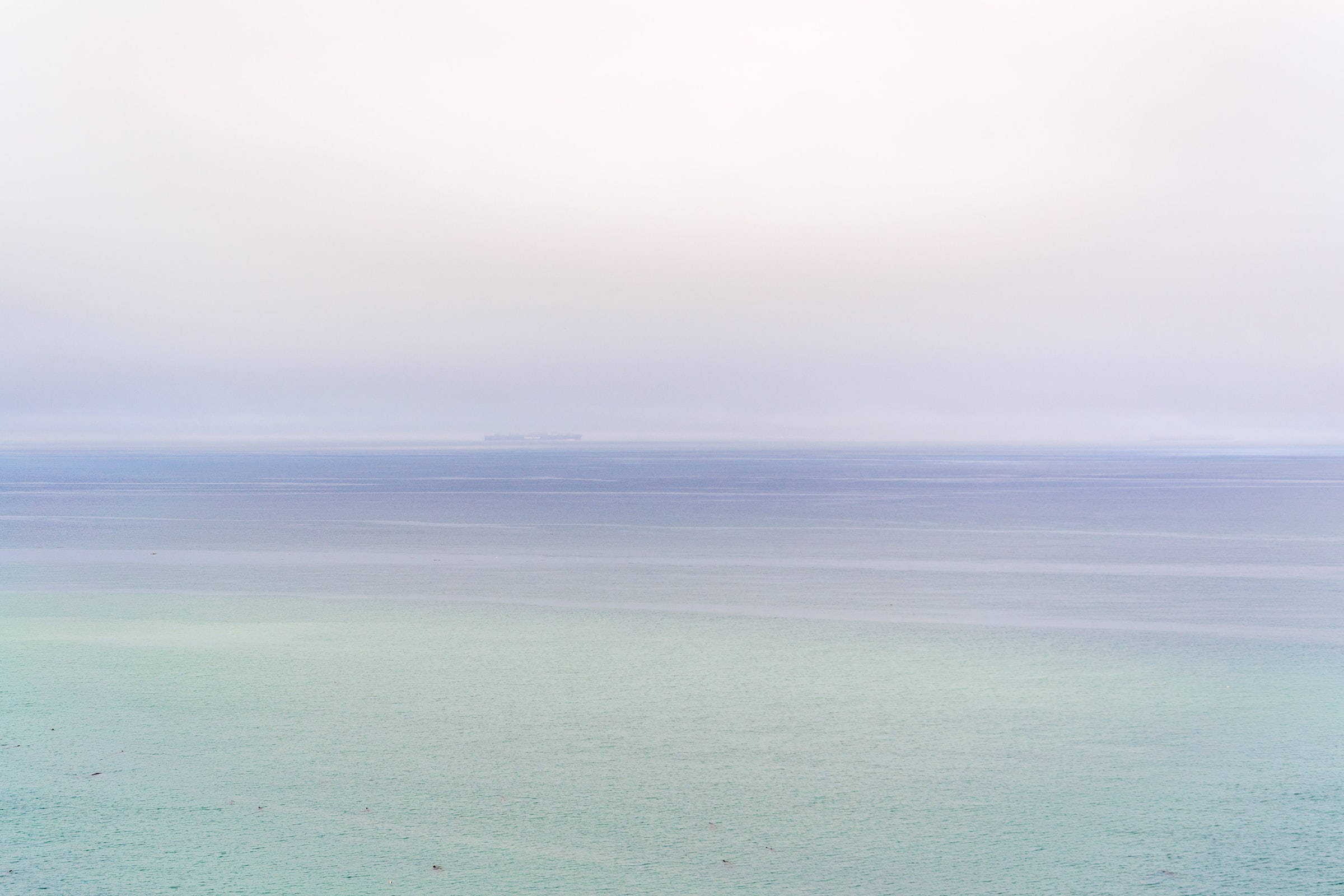 Calm Green Ocean, vast calm sea, soft hazy sky, Full HD Desktop Wallpaper