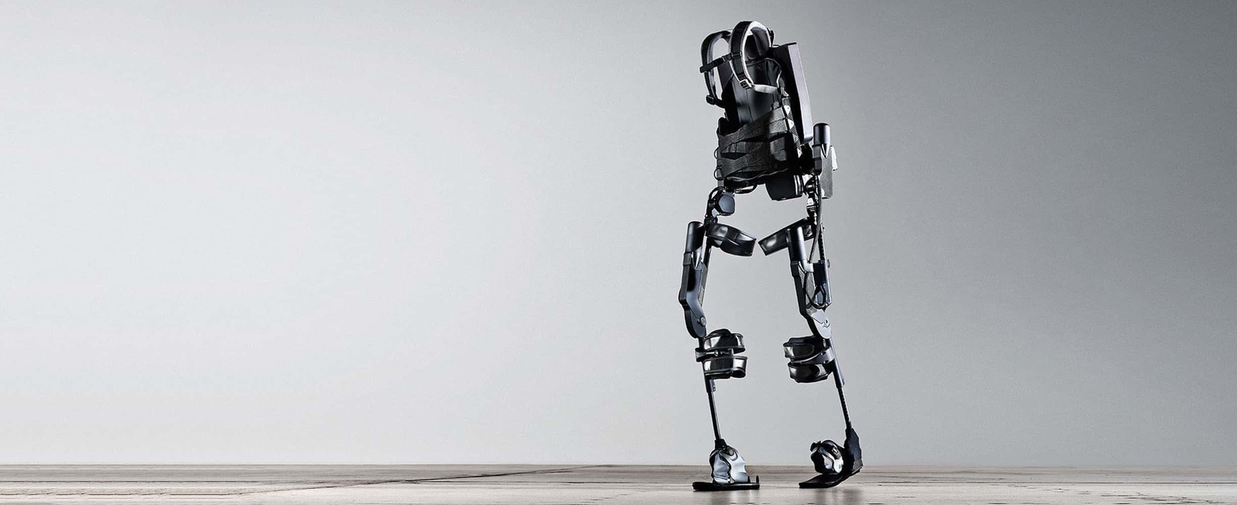 therapeutic desktop, 2449 x 1000, sleek black humanoid robot, Full HD Desktop Wallpaper
