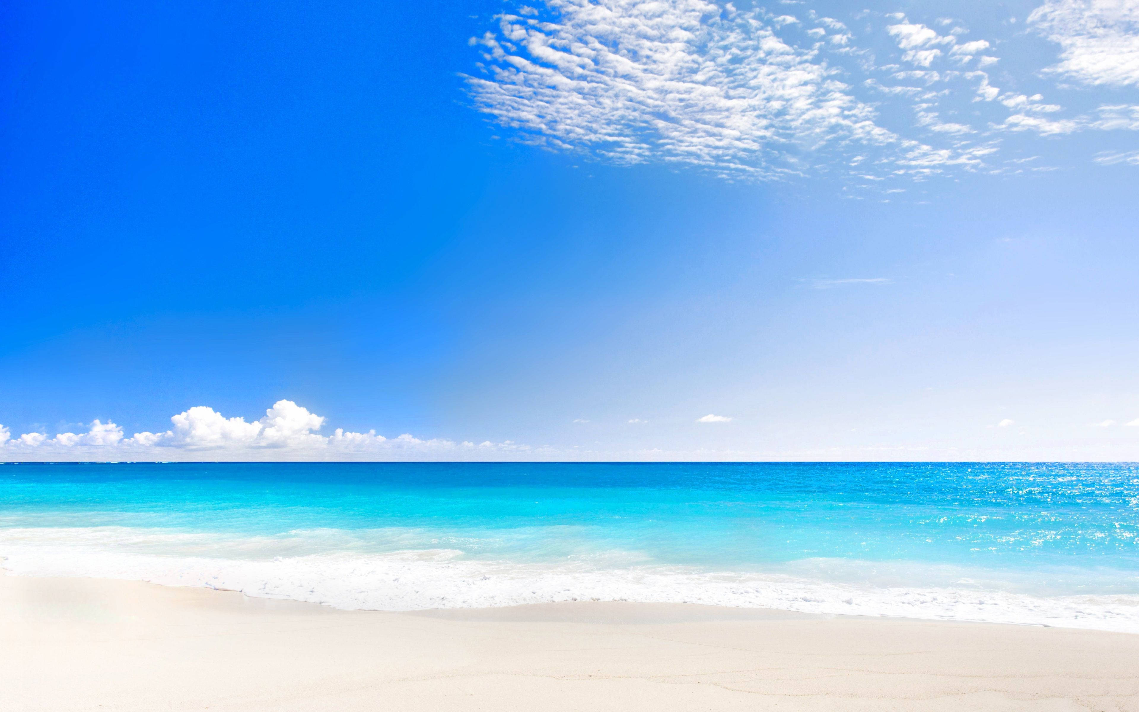 pristine white sand beach, turquoise ocean waves, vast blue sky, 4K Desktop Wallpaper