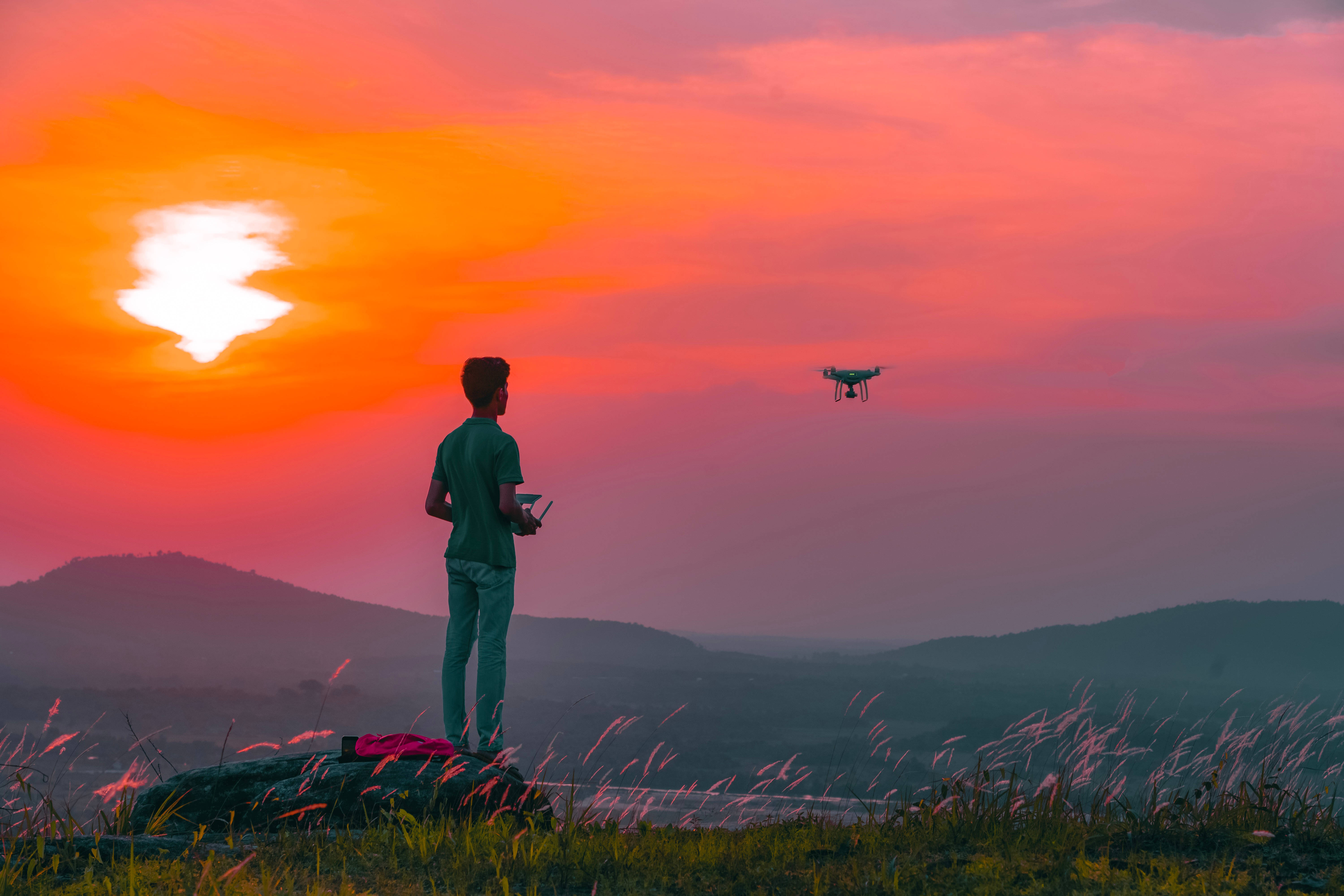 man, drone, grass hill, 5K Desktop Wallpaper