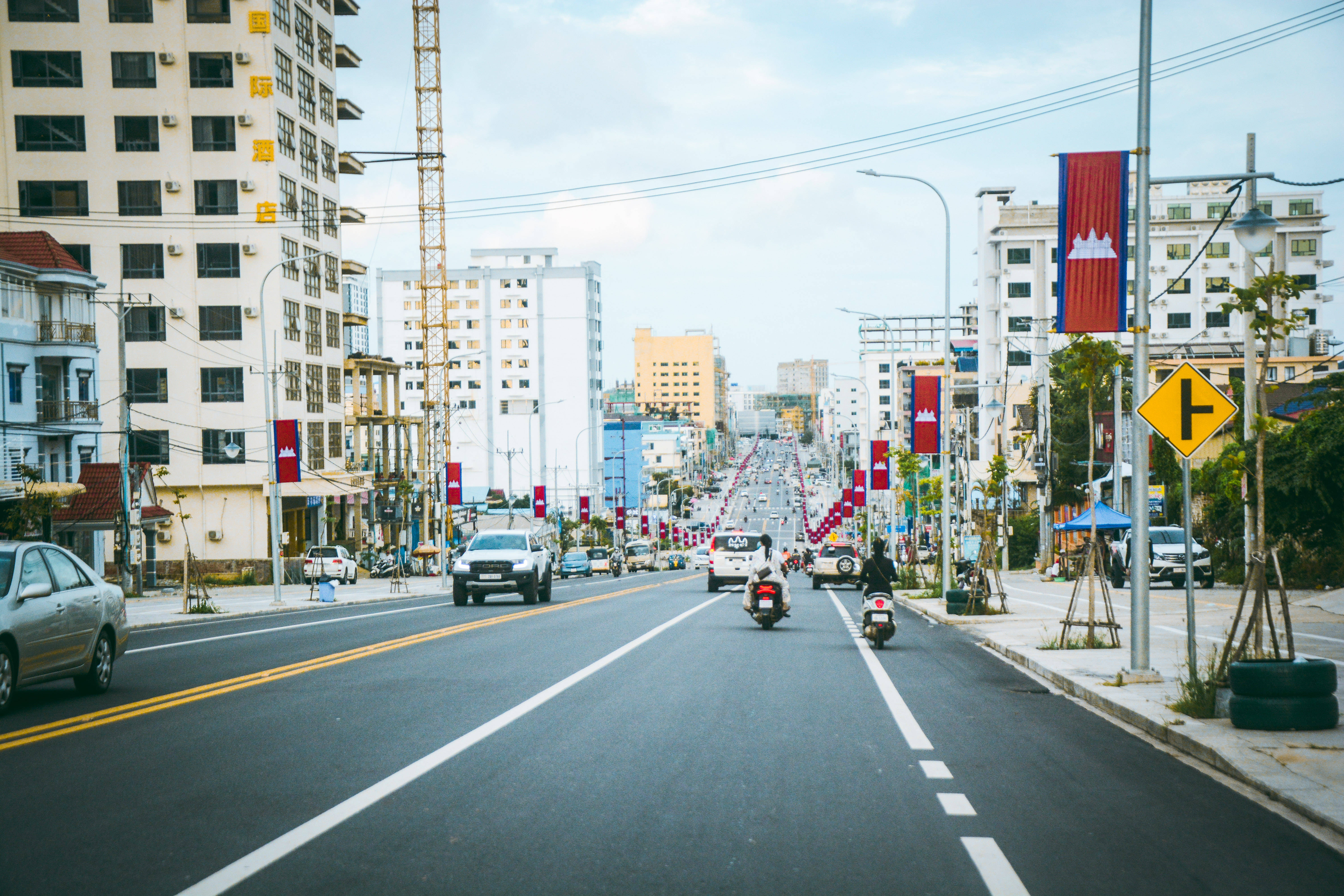 Cambodia, city highway, red national flags, 5K Desktop Wallpaper