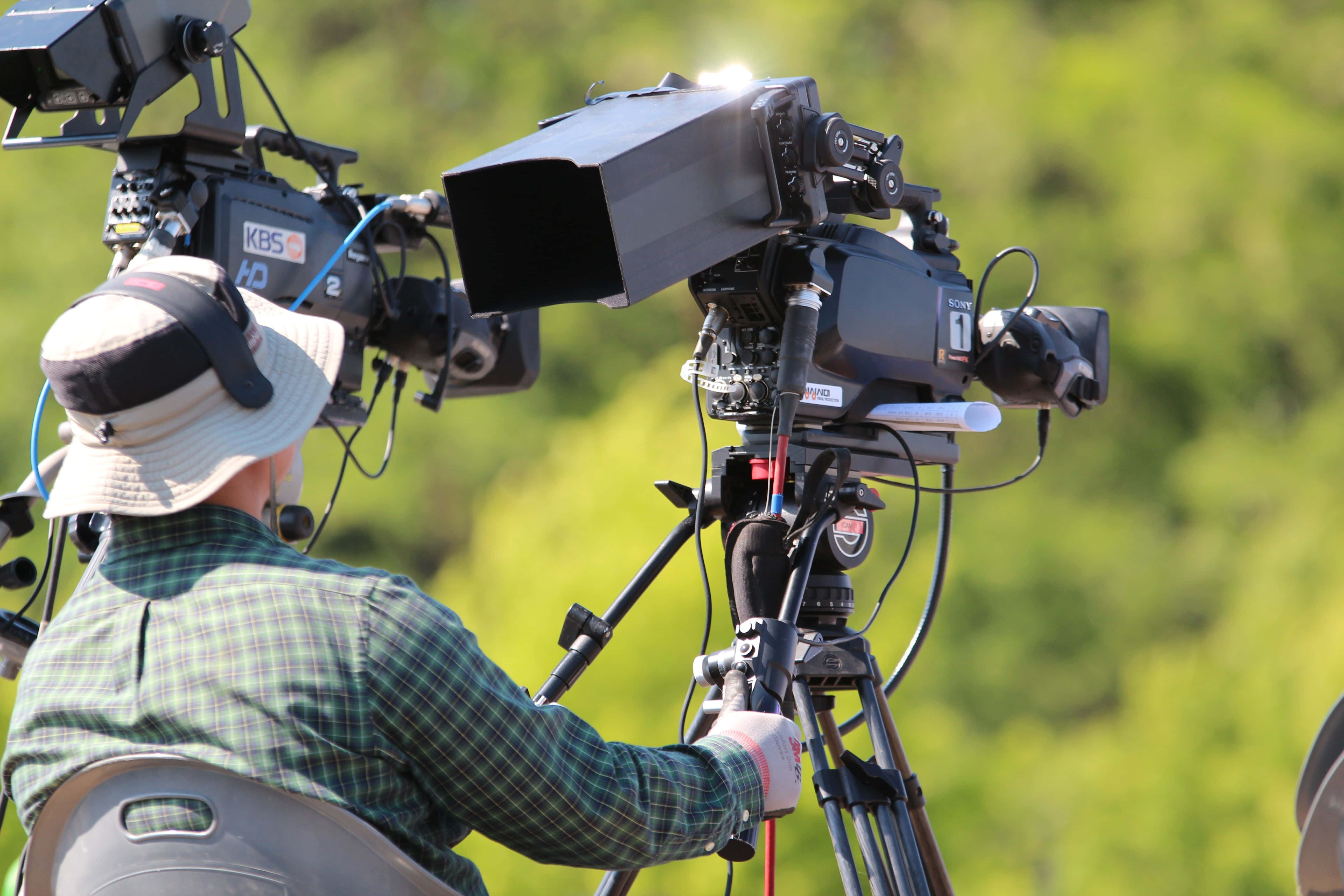 professional video camera, tripod, plaid shirt, 5K Desktop Wallpaper