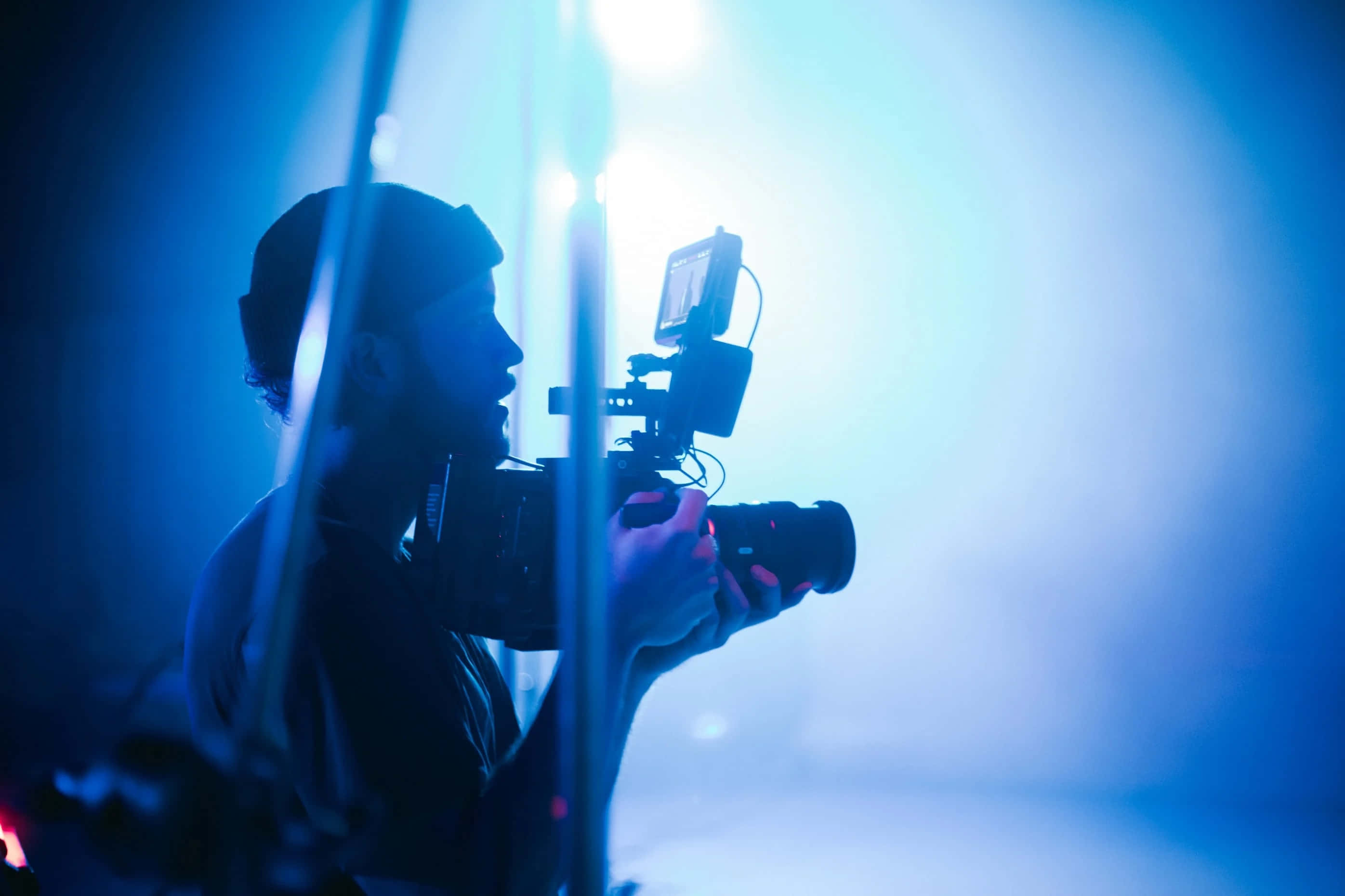 cinematographer, blue haze, silhouette, 2K Desktop Wallpaper