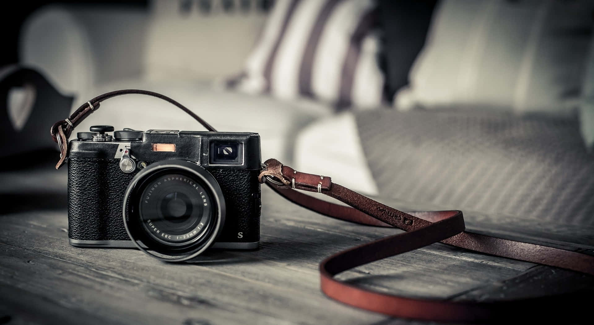 vintage black camera, leather strap, weathered wooden table, HD Desktop Wallpaper