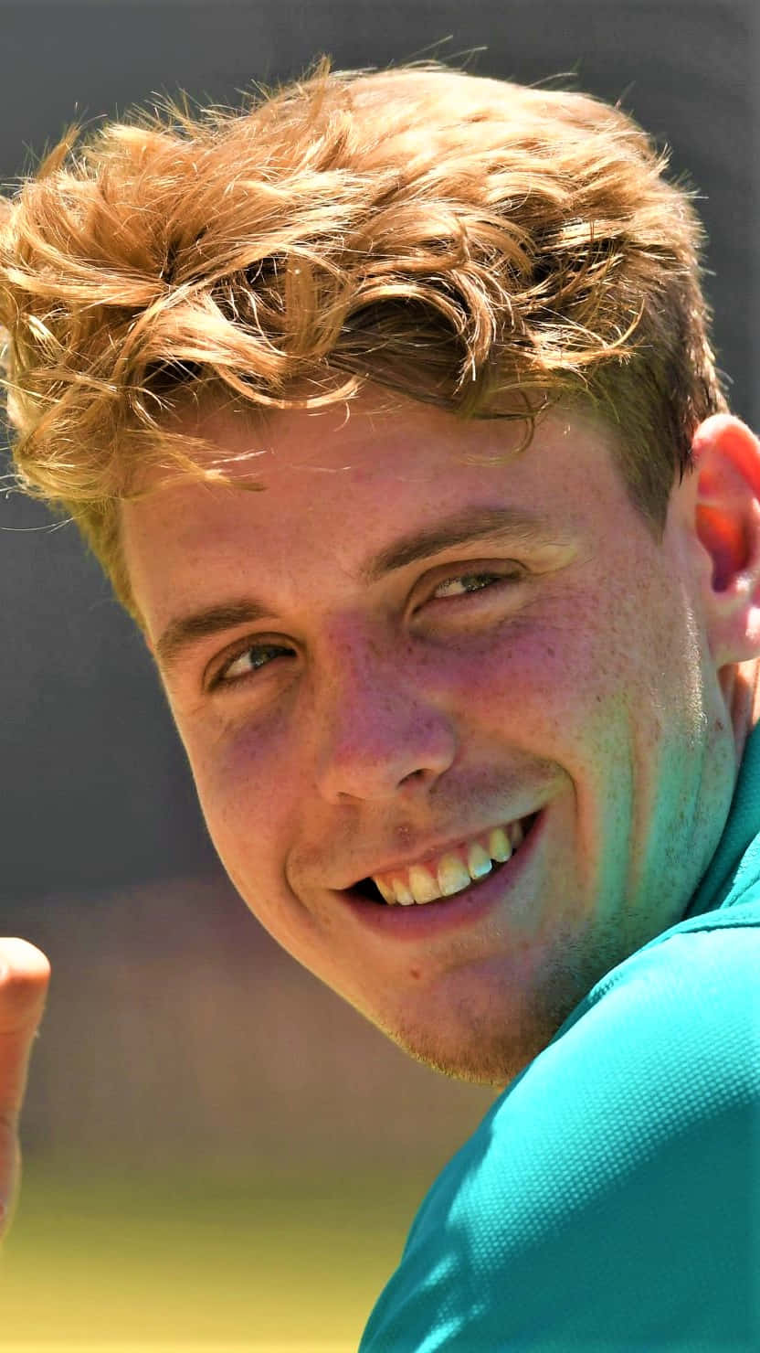 Cameron Green, teal shirt, tousled blond hair, HD Phone Wallpaper