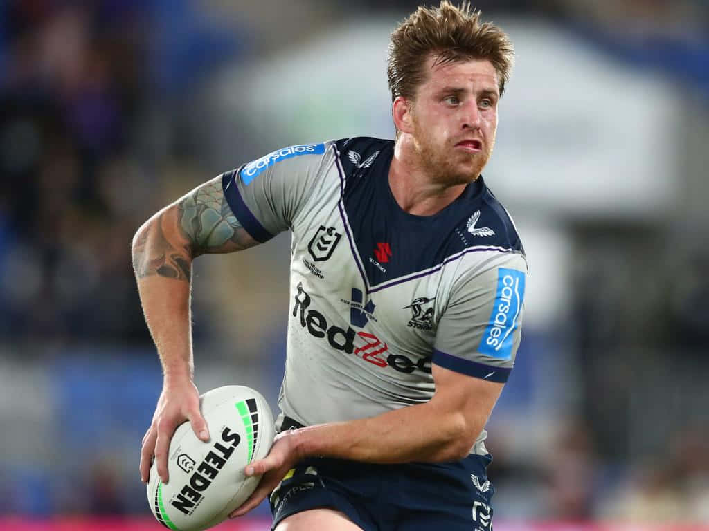 Cameron Munster, grey and navy jersey, white Steeden ball, SD Desktop Wallpaper