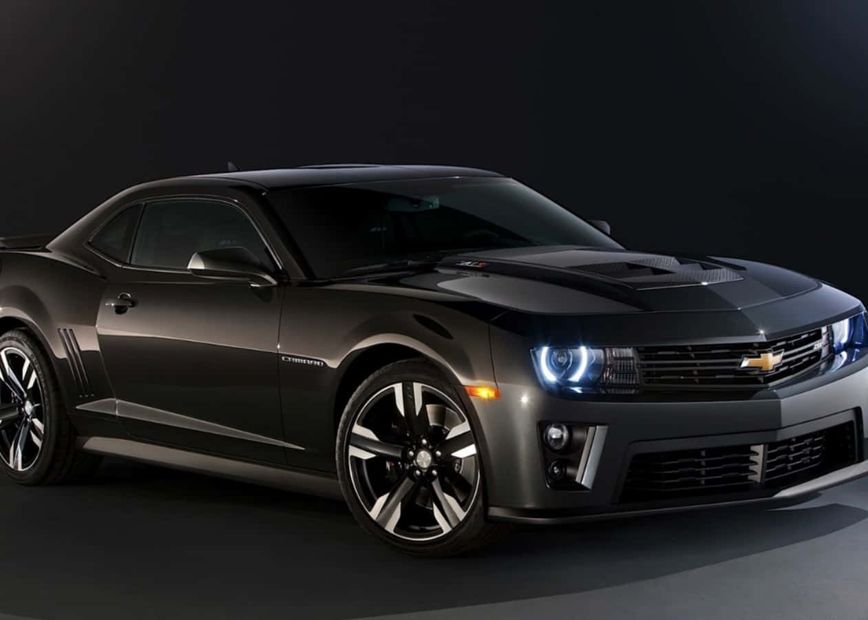 2013 Chevrolet Camaro, sleek black, glowing blue headlights, SD Desktop Wallpaper