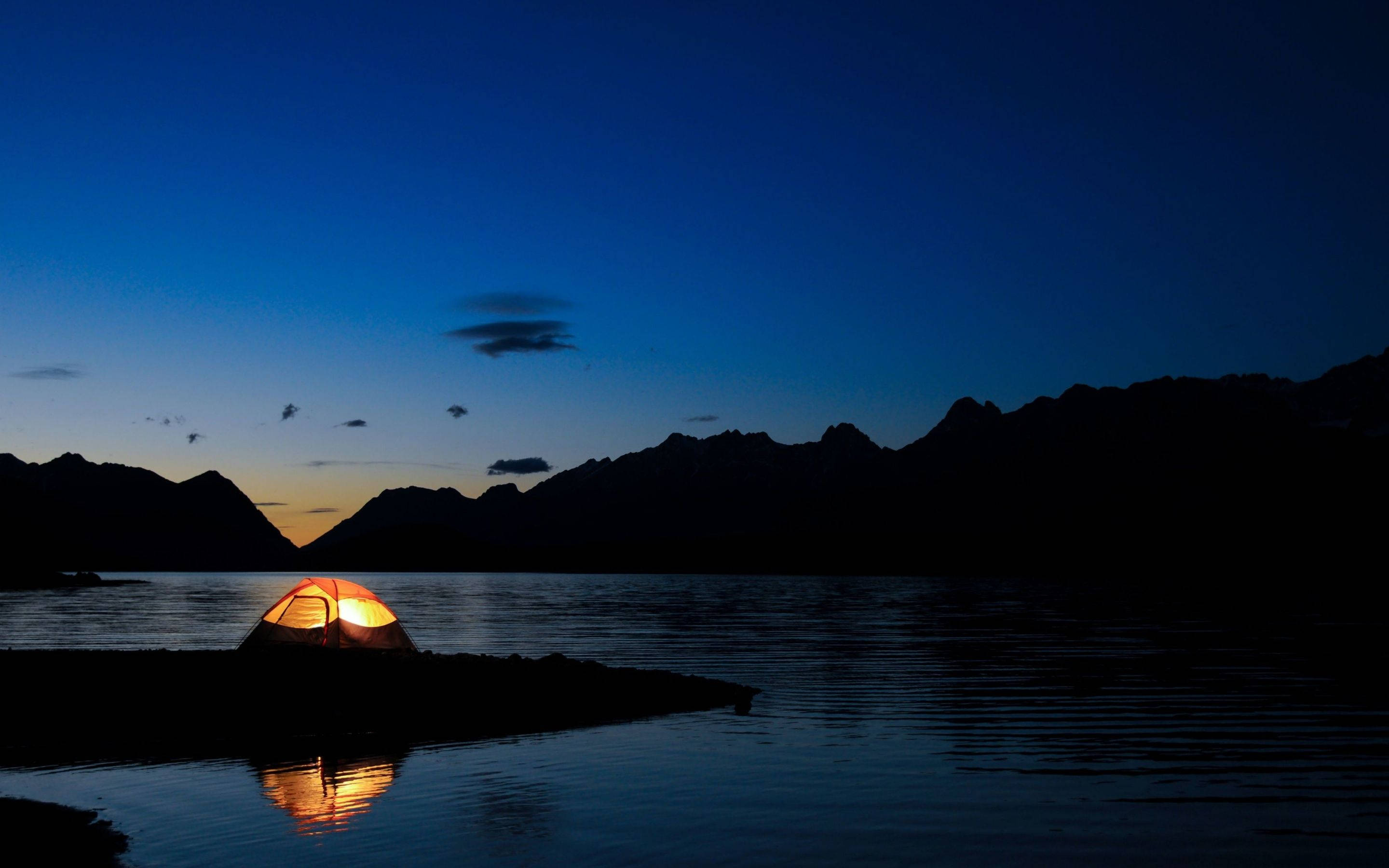 glowing orange tent, lakeshore, twilight, 2K Desktop Wallpaper