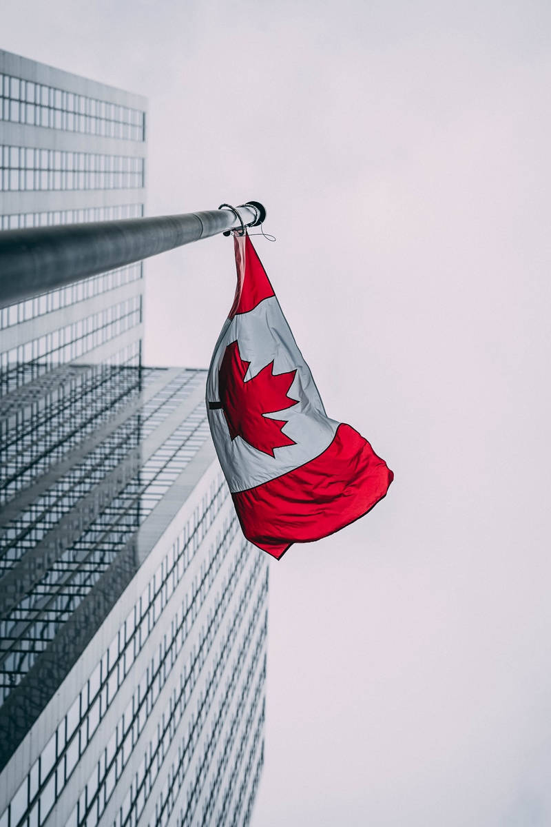 Canada flag, glass skyscraper, overcast sky, SD Phone Wallpaper
