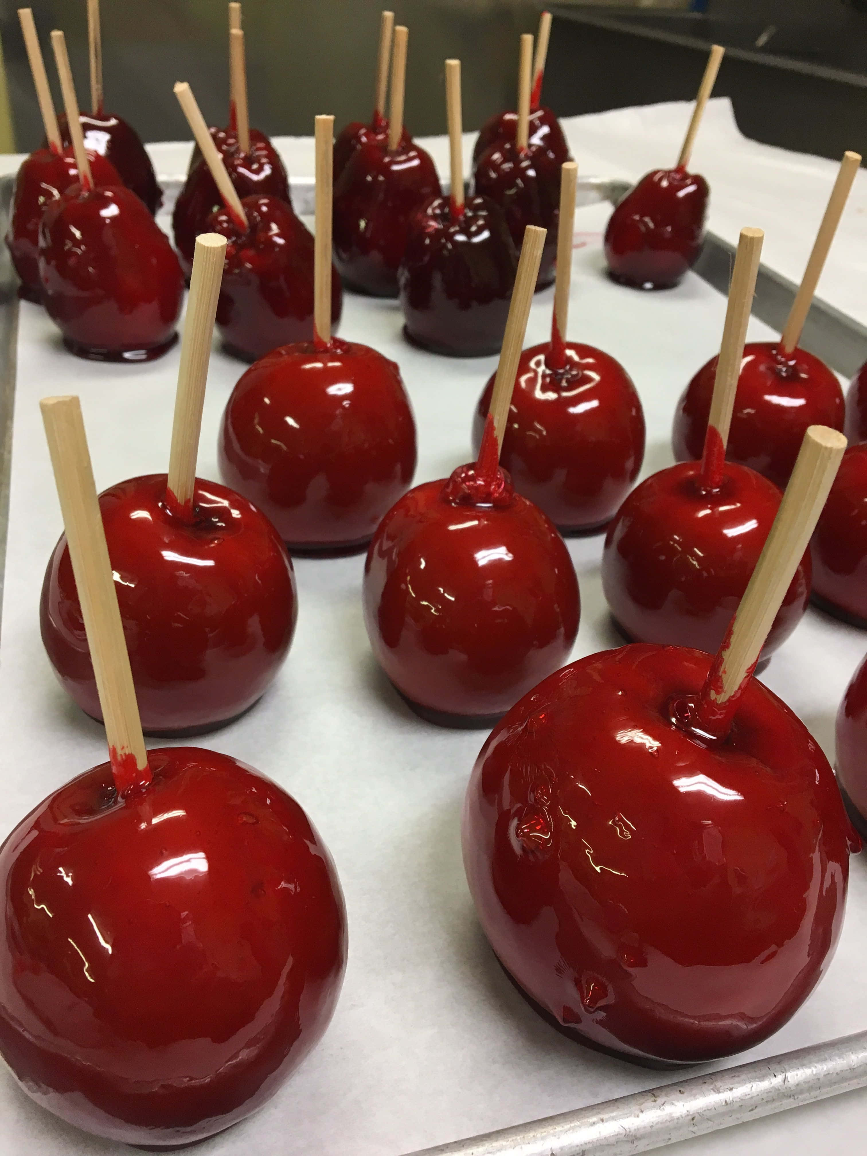 Candy Apples, glossy red, on sticks, 4K Phone Wallpaper