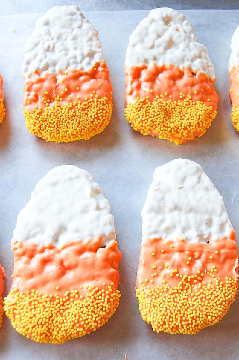 Candy Corn, orange and white icing, yellow sprinkles, SD Phone Wallpaper