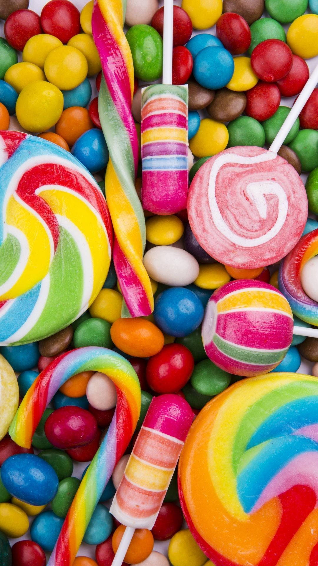 rainbow lollipops, colorful candies, vibrant close-up, Full HD Phone Wallpaper