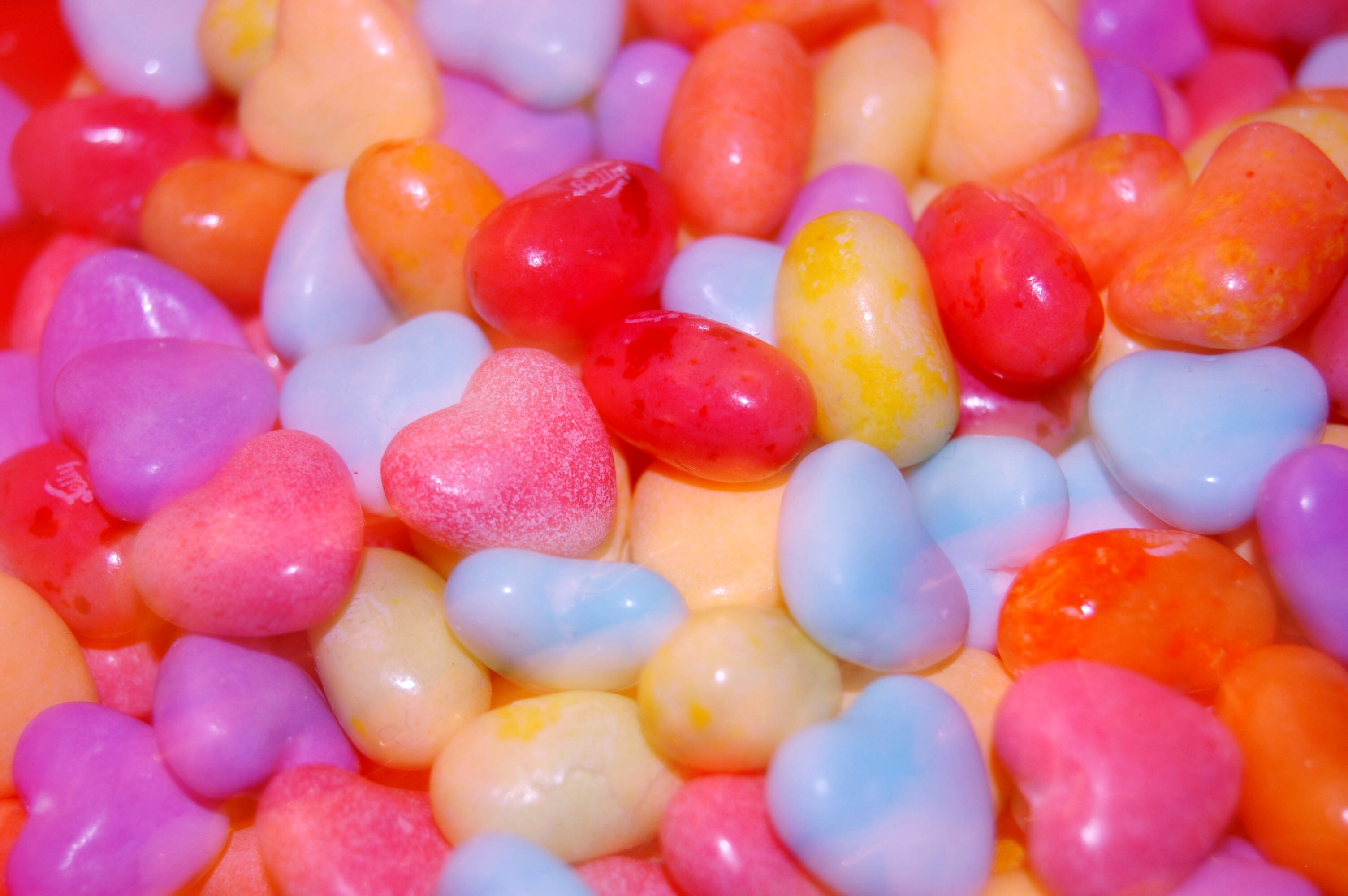heart-shaped candies, vibrant pastel, bright hues, 2K Desktop Wallpaper