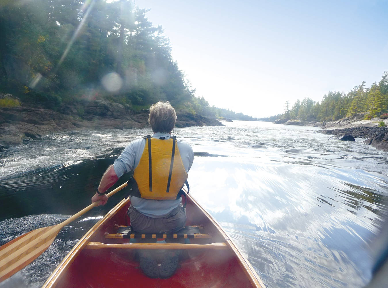 Canoeing Man, red canoe, sunlit river, HD Desktop Wallpaper