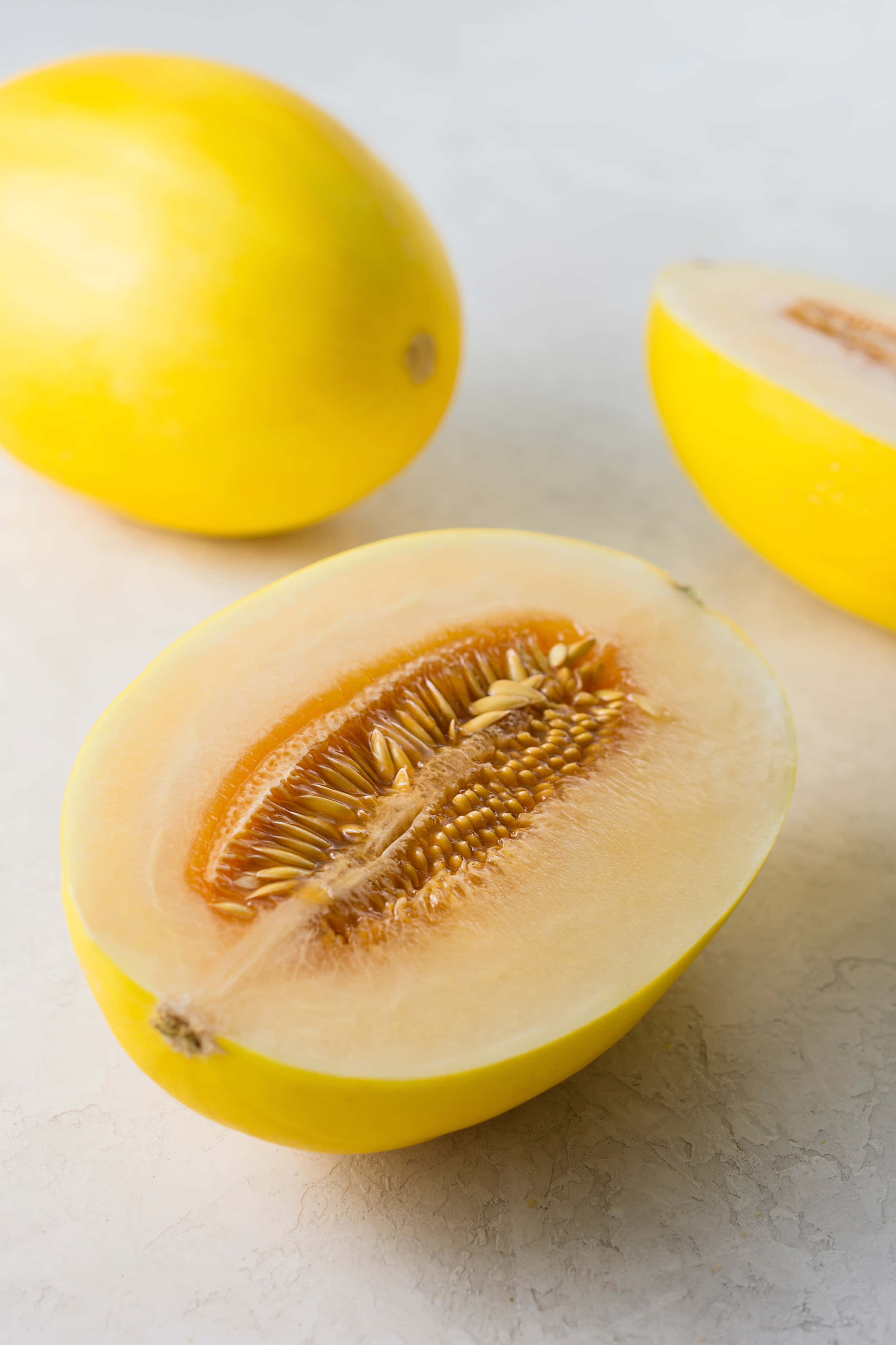 yellow crenshaw melon, cantaloupe fruits, juicy flesh, 2K Phone Wallpaper