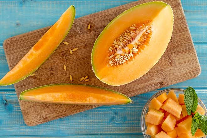 Cantaloupe, wooden cutting board, blue wooden surface, SD Desktop Wallpaper