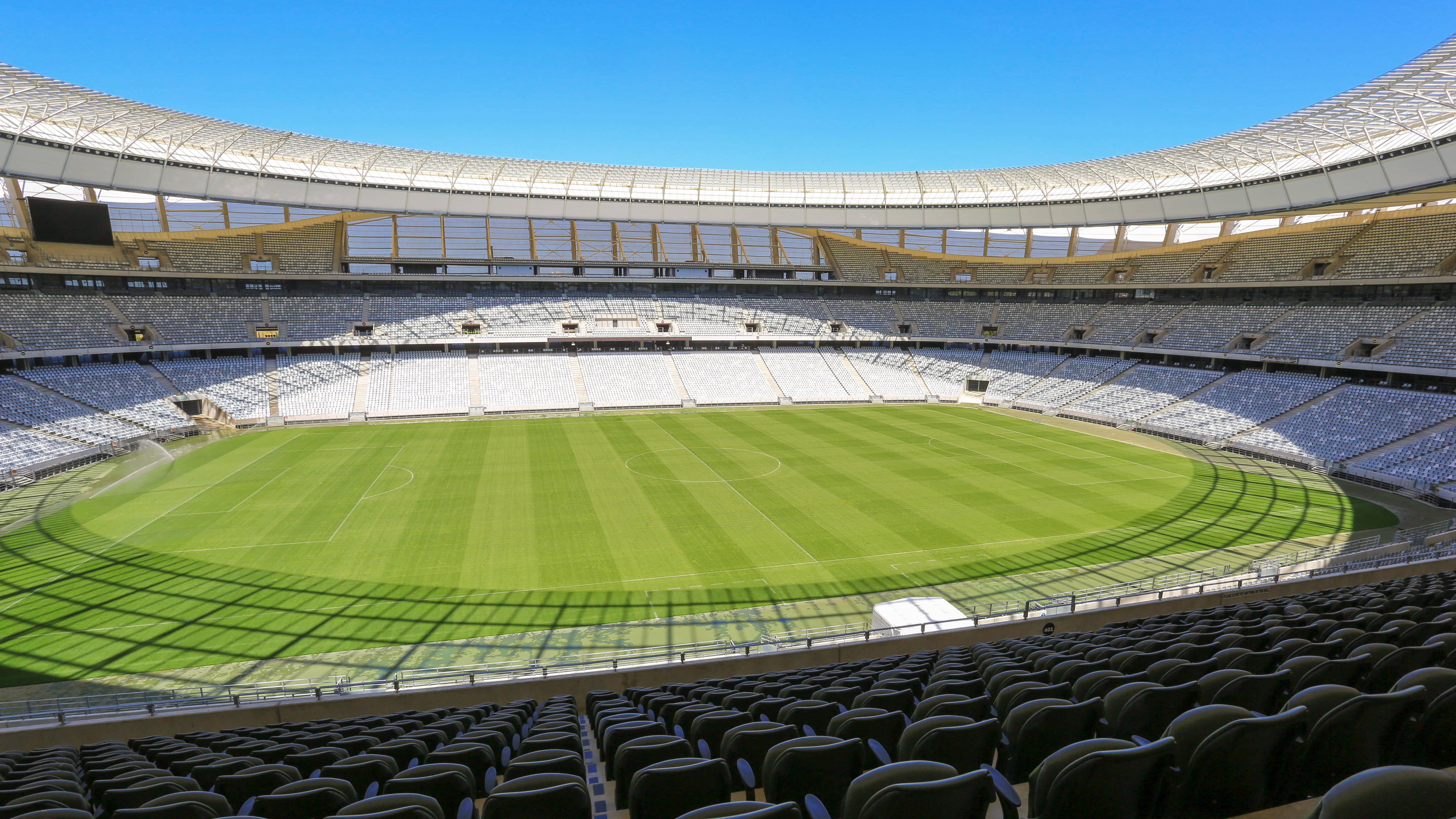 Cape Town Stadium, pristine green turf, white and black seats, 5K Desktop Wallpaper