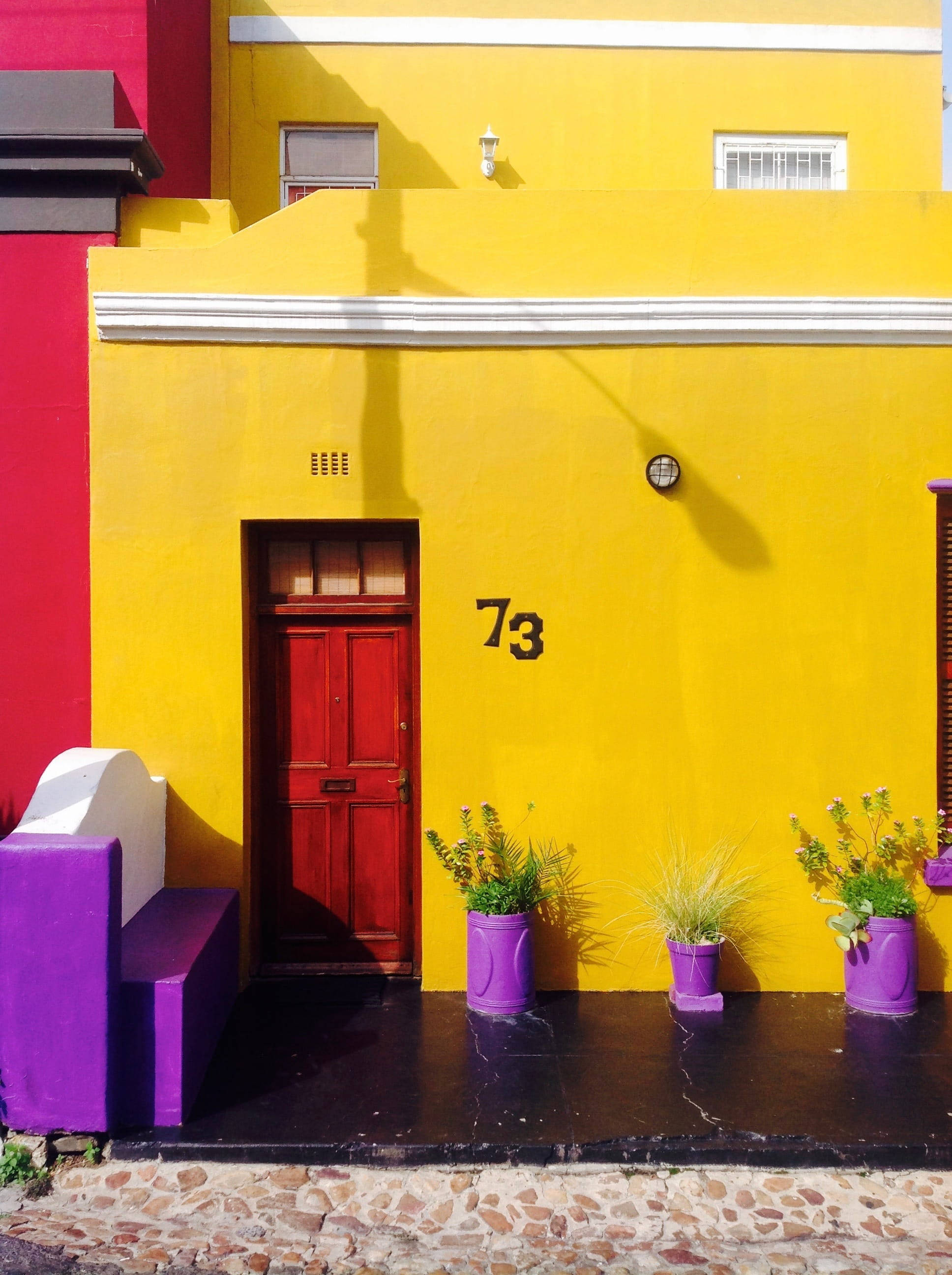 Cape Town, vibrant yellow building, red door, 2K Phone Wallpaper
