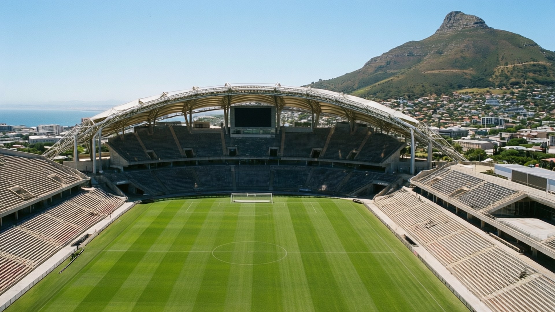 Cape Town Stadium, vibrant green turf, clear blue sky, Full HD Desktop Wallpaper