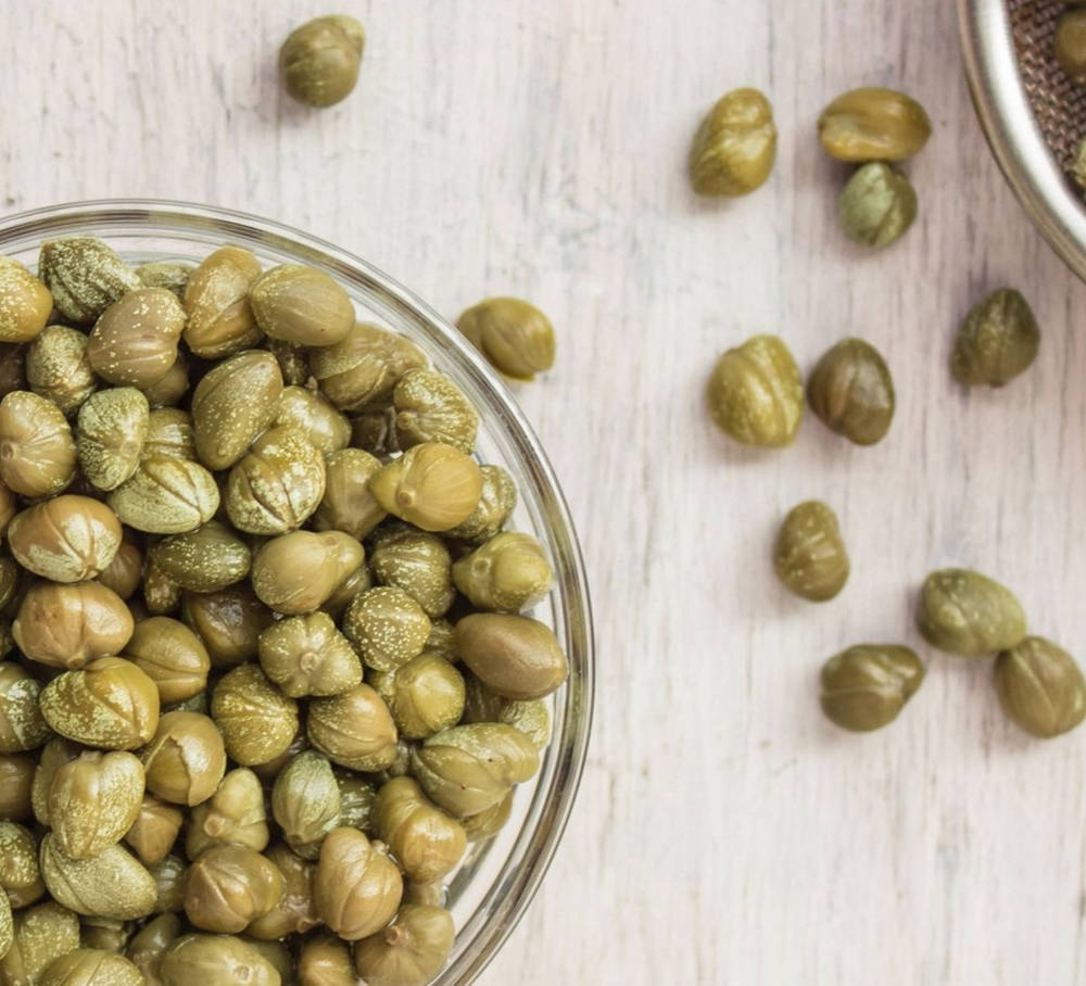 Capers, clear glass bowl, glistening green capers, SD Desktop Wallpaper