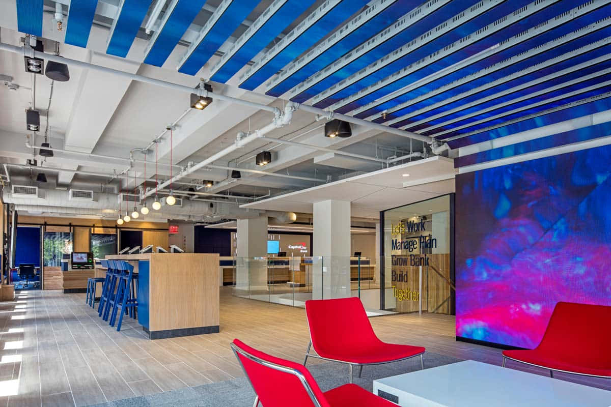 Capital One, red chairs, bold blue ceiling panels, SD Desktop Wallpaper
