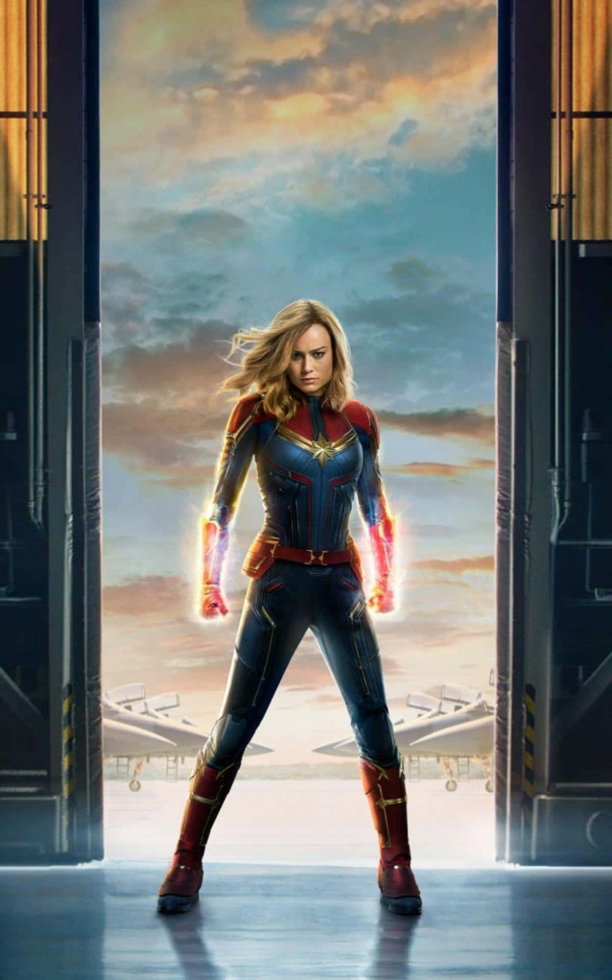 Captain Marvel, hangar doorway, glowing fists, Full HD Phone Wallpaper