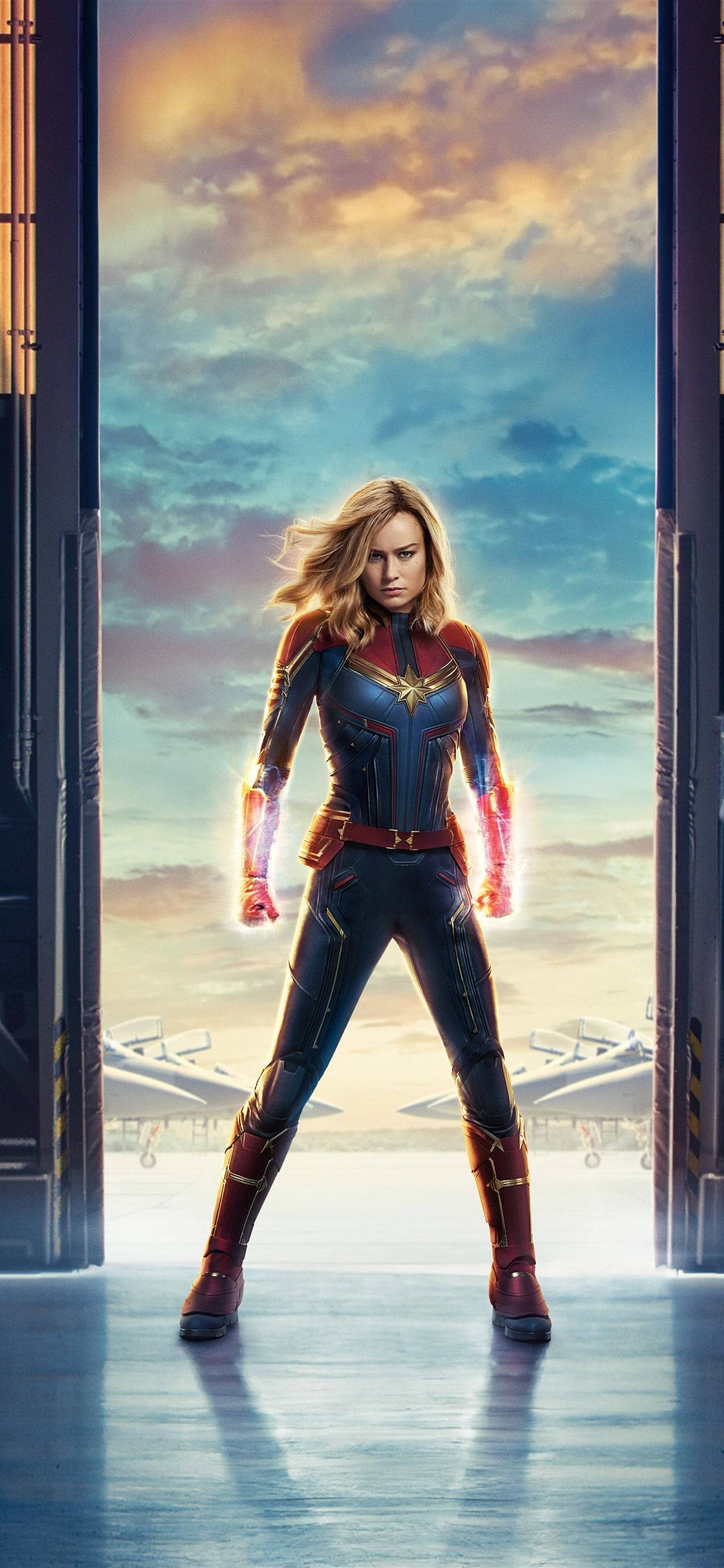 Captain Marvel, doorway, glowing fists, 2K Phone Wallpaper