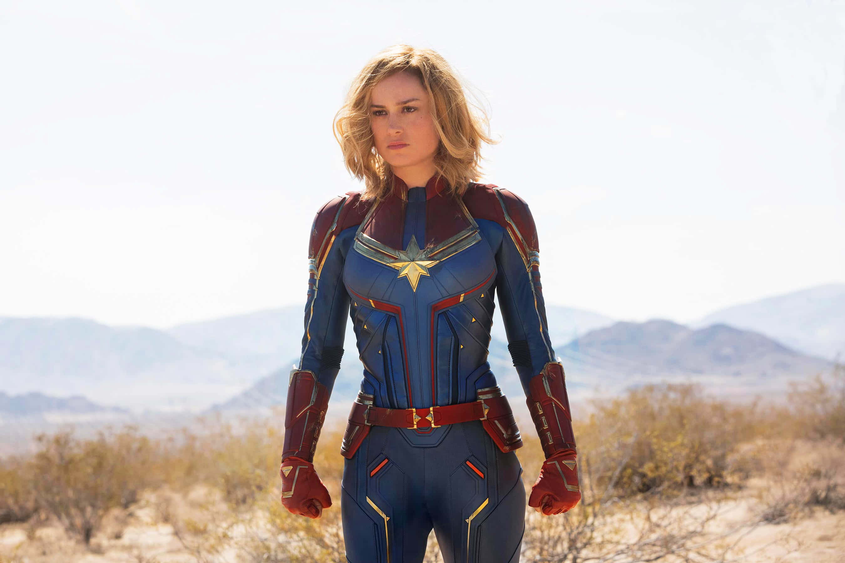 Captain Marvel, blue and red suit, star emblem, 2K Desktop Wallpaper
