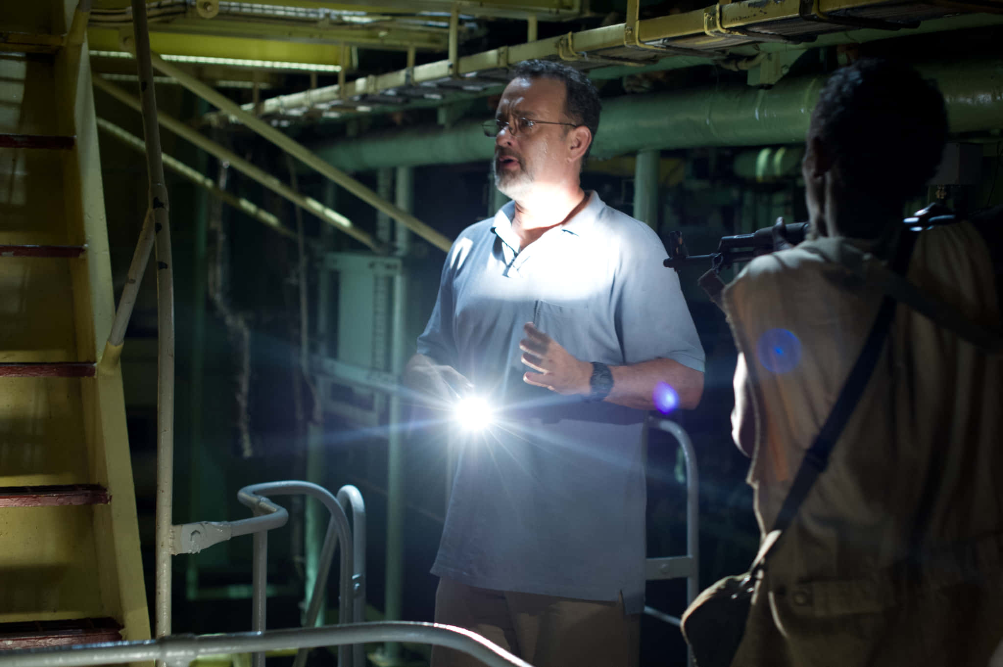Captain Phillips, dim industrial setting, bright flashlight, Full HD Desktop Wallpaper
