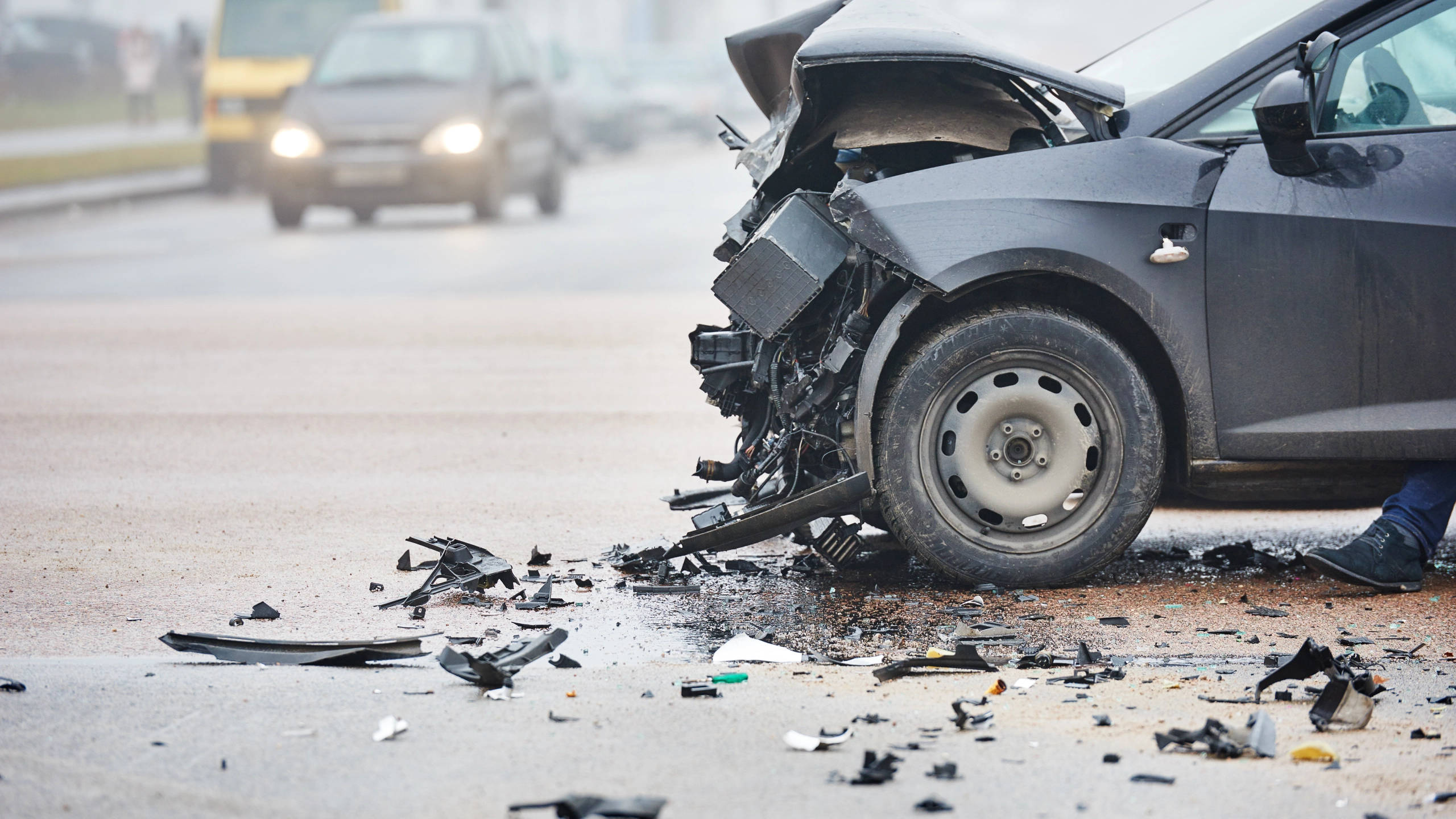 black car, wet road, scattered debris, 2K Desktop Wallpaper