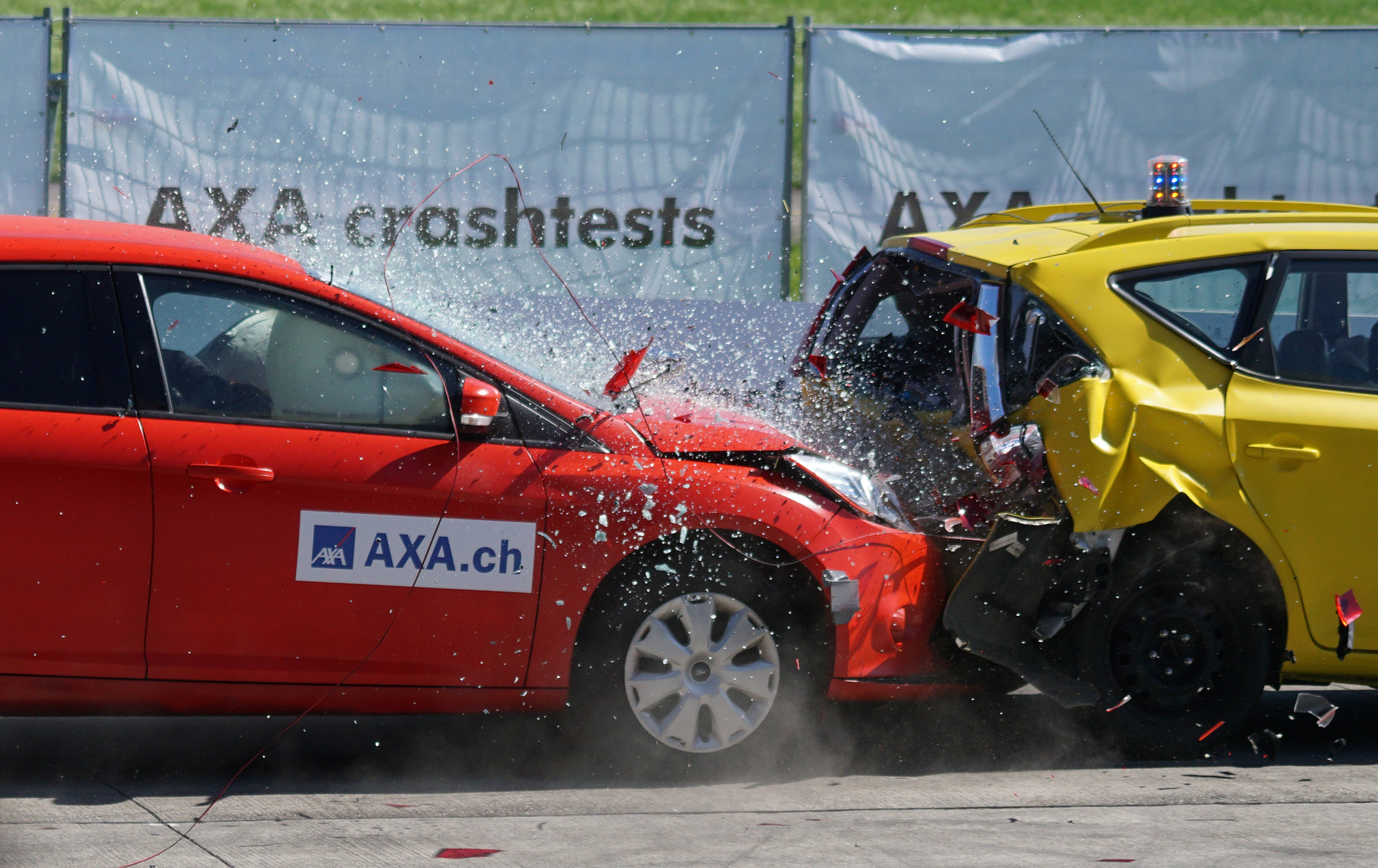red and yellow car, controlled crash test, debris flying, 5K Desktop Wallpaper