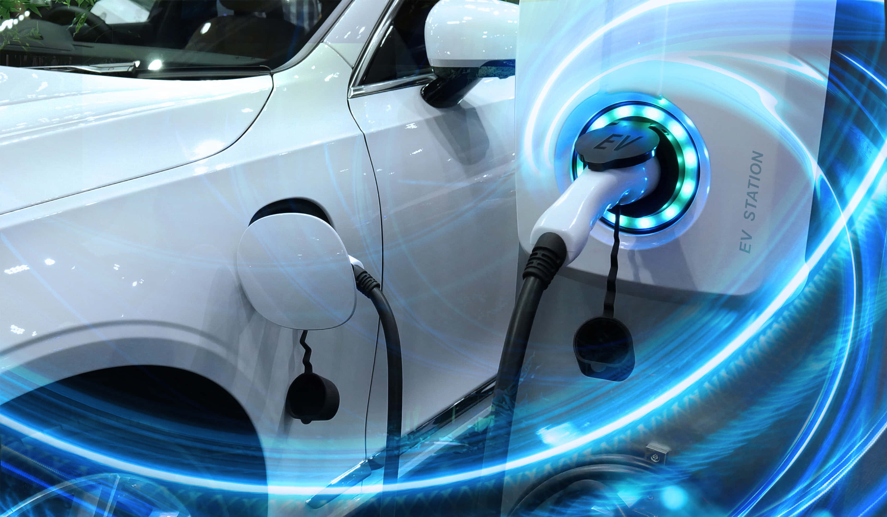 sleek white electric car, glowing blue EV station, dynamic light trails, 2K Desktop Wallpaper