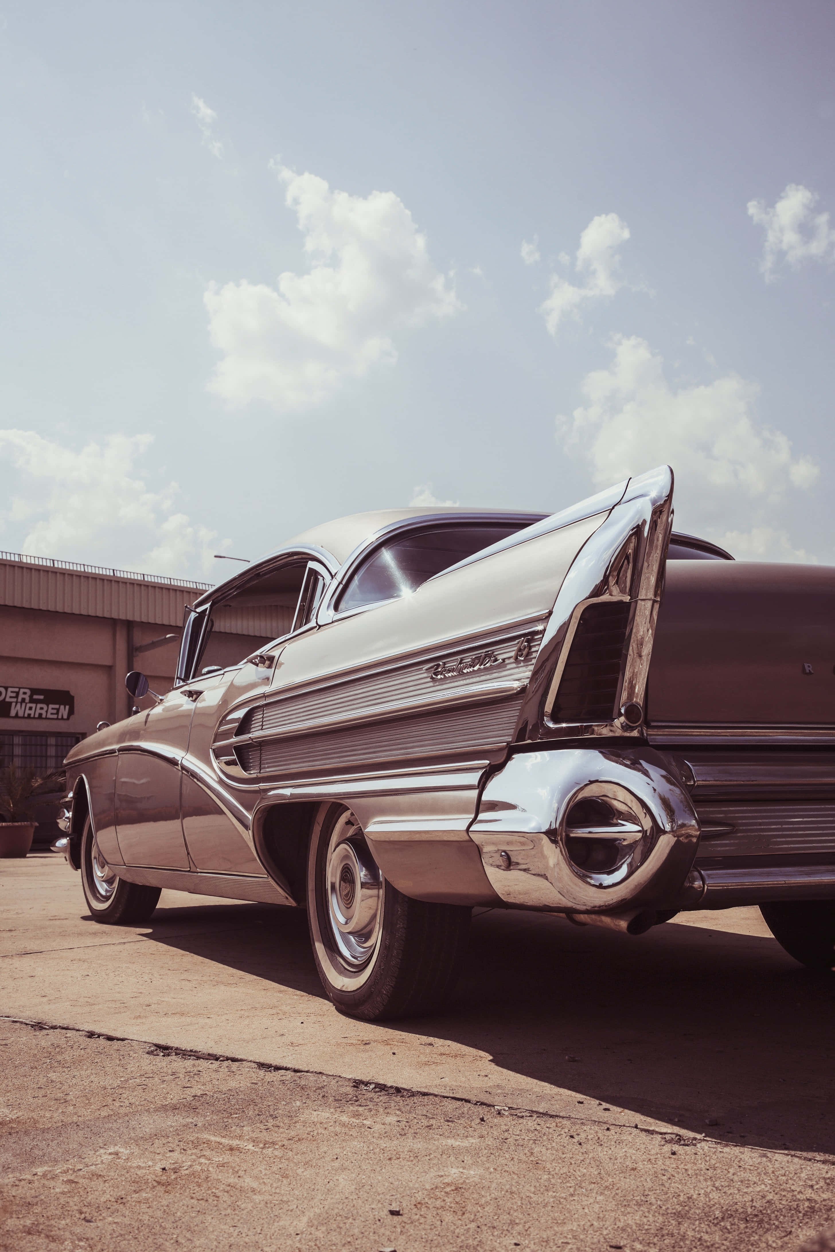 1950s Chevrolet, chrome fins, gleaming silver, 4K Phone Wallpaper